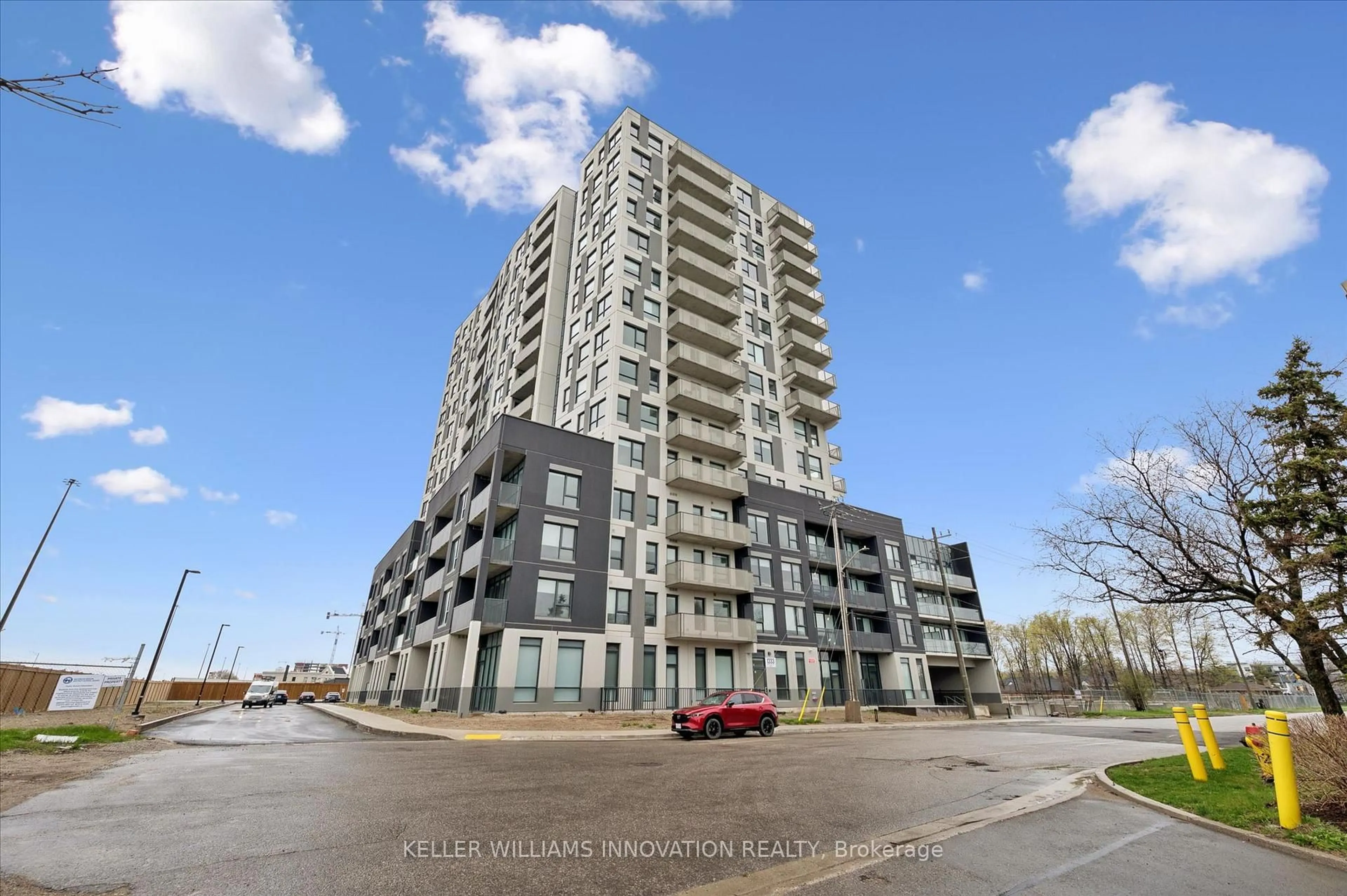 A pic from outside/outdoor area/front of a property/back of a property/a pic from drone, building for 1333 Weber St #214, Kitchener Ontario N2A 1C2