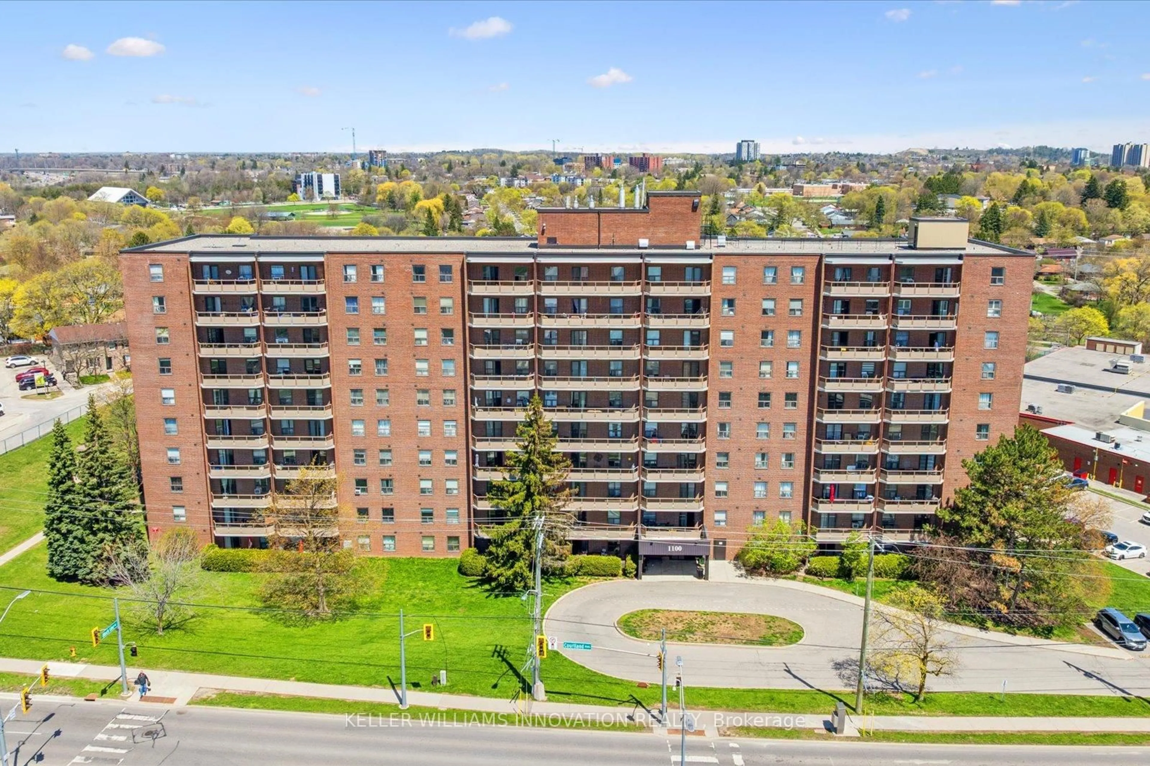 A pic from outside/outdoor area/front of a property/back of a property/a pic from drone, city buildings view from balcony for 1100 Courtland Ave #302, Kitchener Ontario N2C 2H9