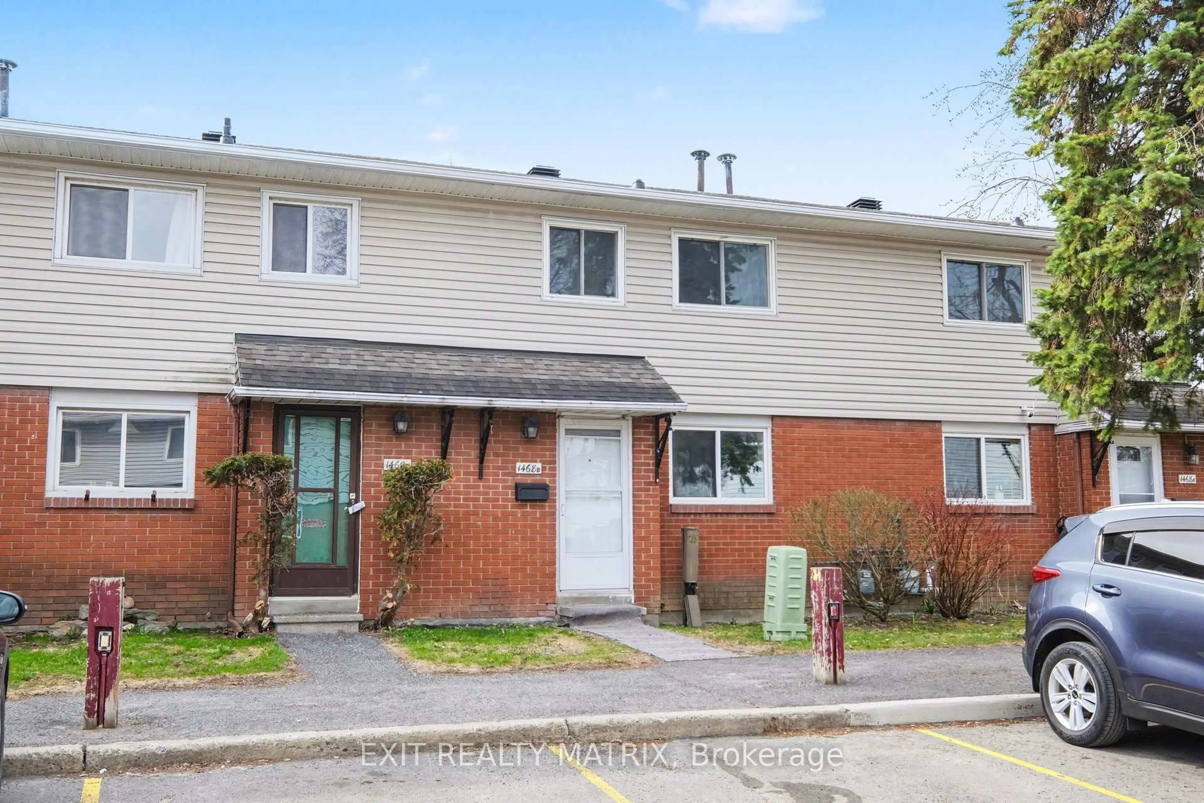 Home with brick exterior material, street for 1468 Heatherington Rd #B, Ottawa Ontario K1V 6S1