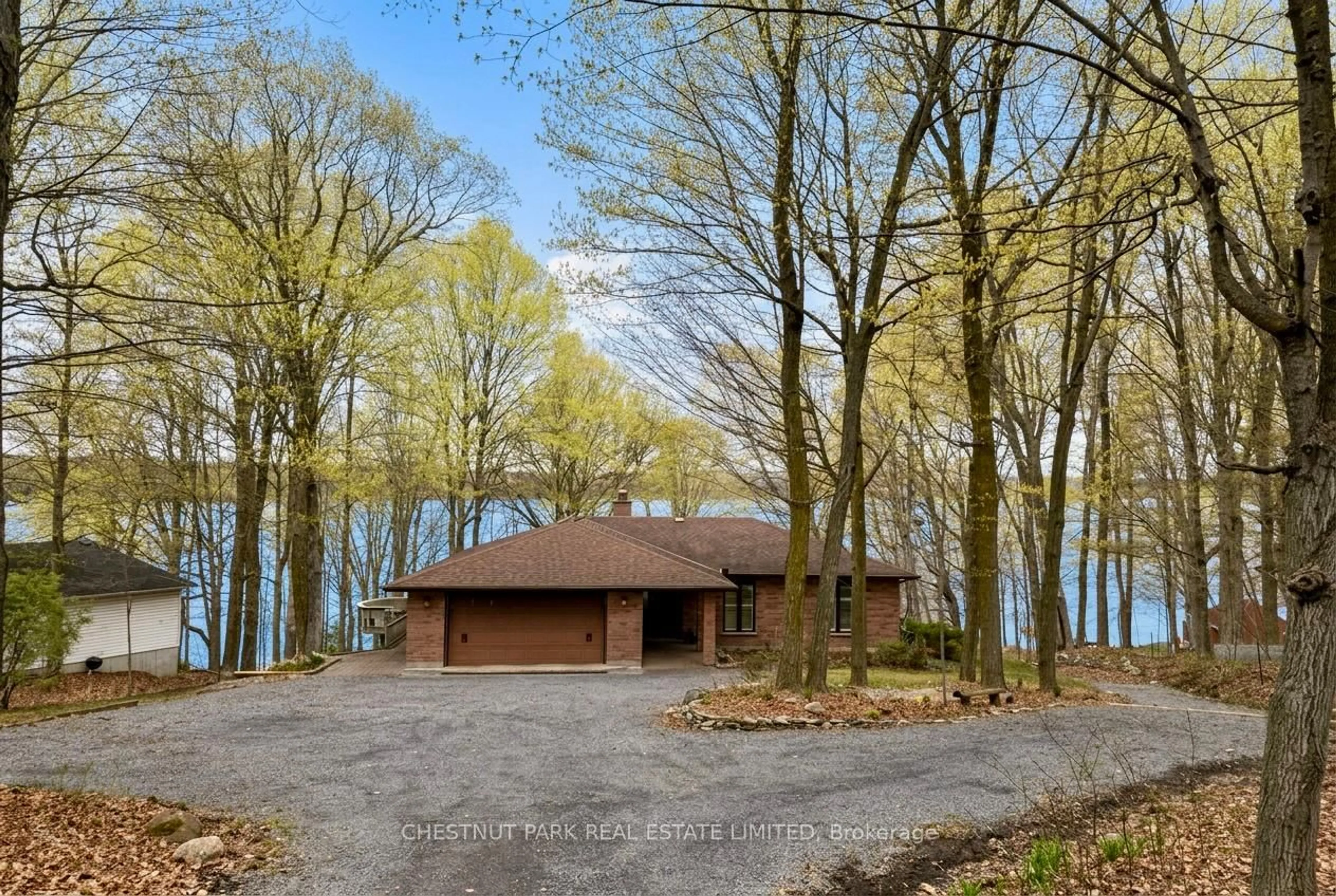 A pic from outside/outdoor area/front of a property/back of a property/a pic from drone, water/lake/river/ocean view for 12154 Loyalist Pkwy, Prince Edward County Ontario K0K 2T0
