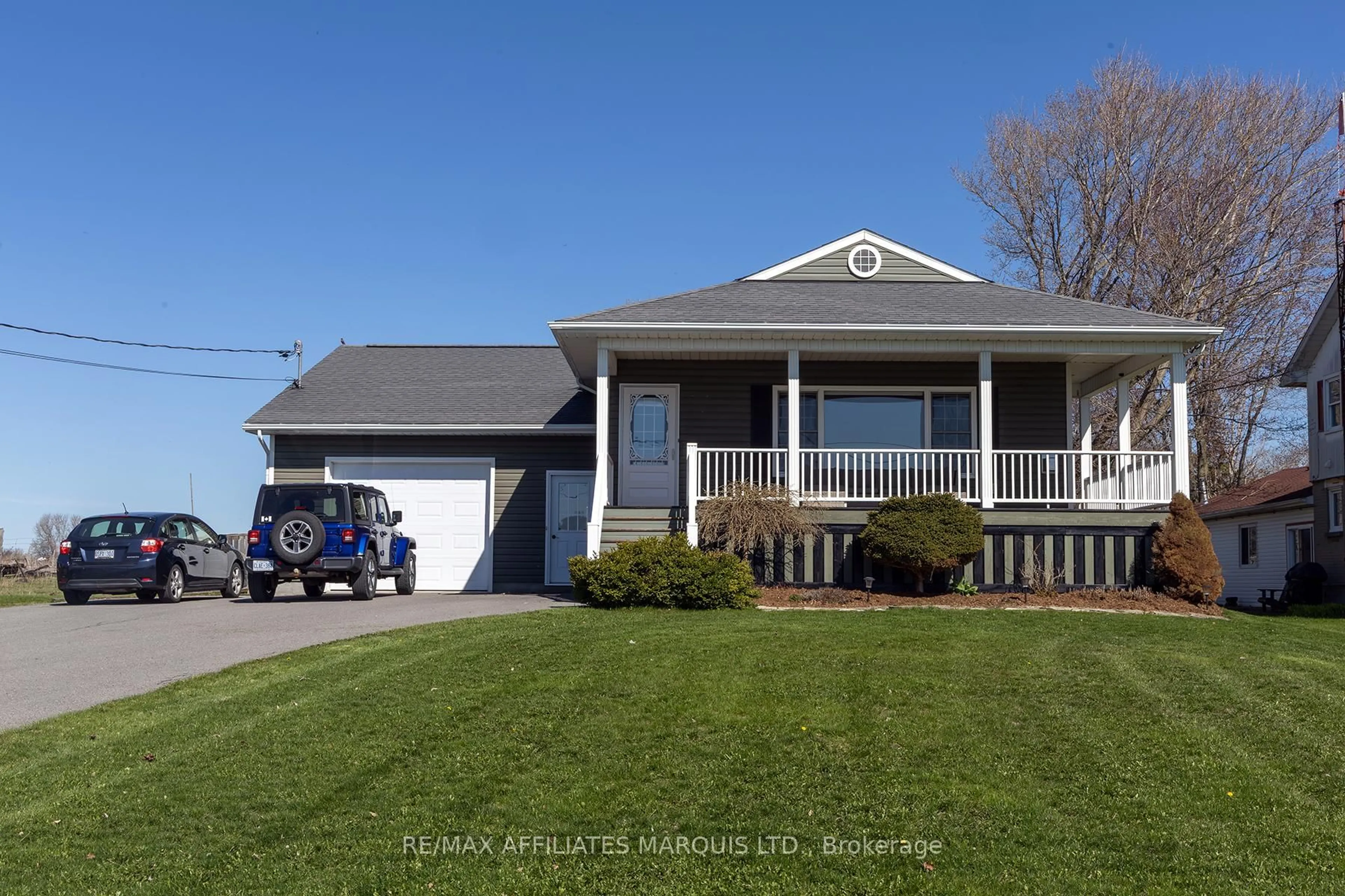 Home with vinyl exterior material, street for 11851 Lakeshore Dr, South Dundas Ontario K0C 1X0