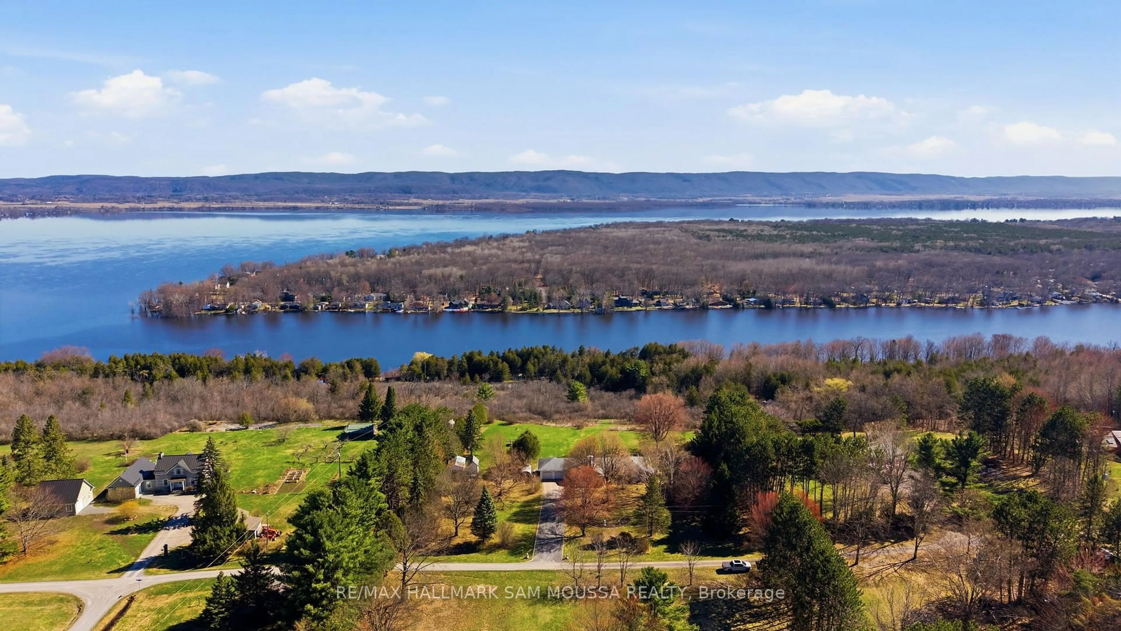 A pic from outside/outdoor area/front of a property/back of a property/a pic from drone, water/lake/river/ocean view for 122 Colonel Nicholson Lane, Ottawa Ontario K0A 3M0