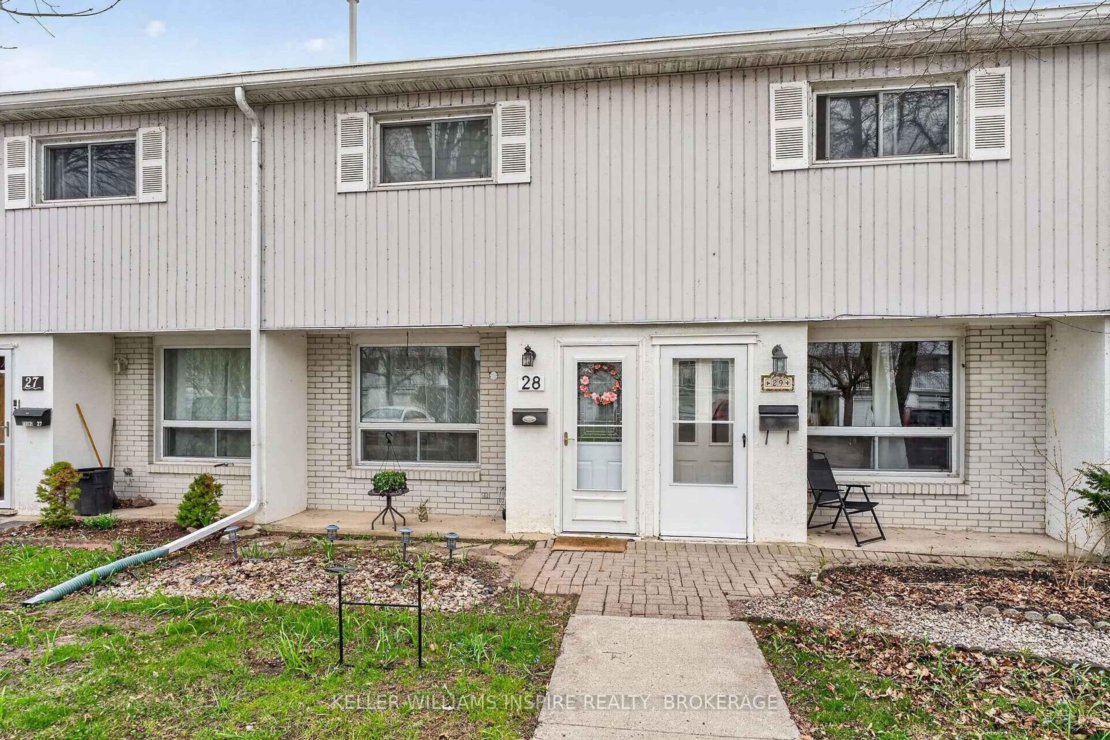 Home with vinyl exterior material, street for 4427 Bath Rd #28, Loyalist Ontario K7N 1A1