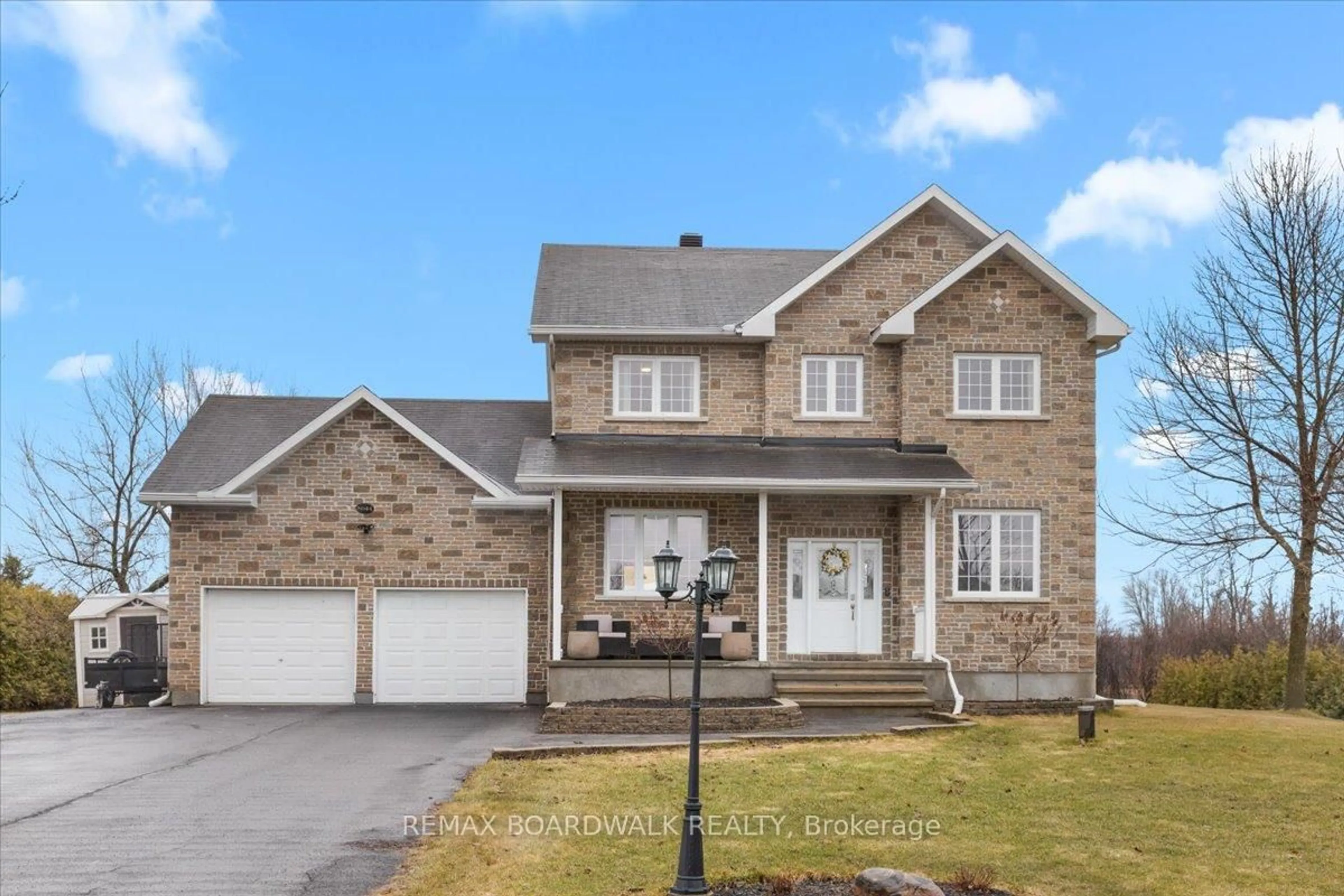 Home with brick exterior material, street for 8044 Craig Farm Dr, Metcalfe Ontario K0A 2P0