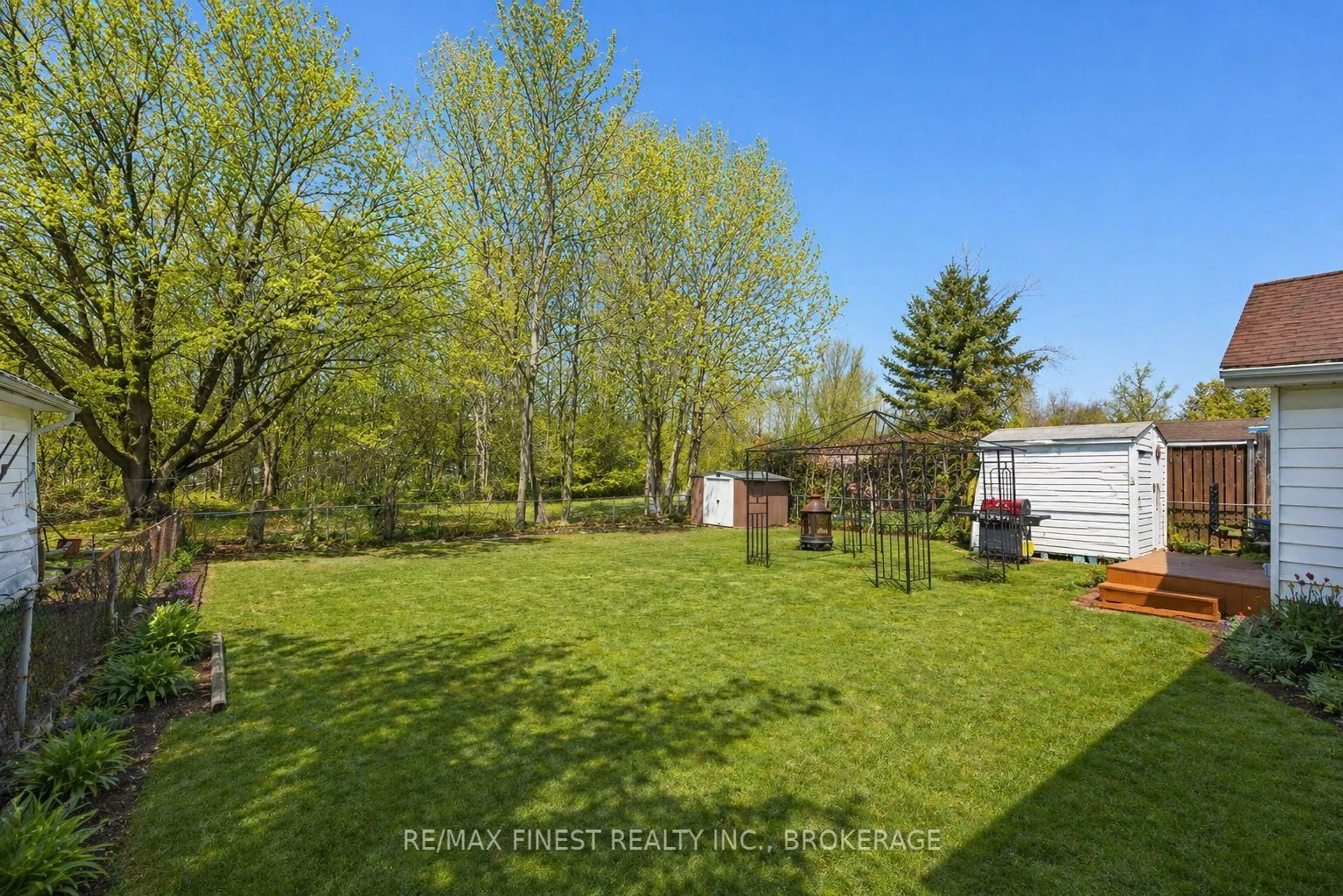 A pic from outside/outdoor area/front of a property/back of a property/a pic from drone, forest/trees view for 676 Laurier Blvd, Brockville Ontario K6V 5X8