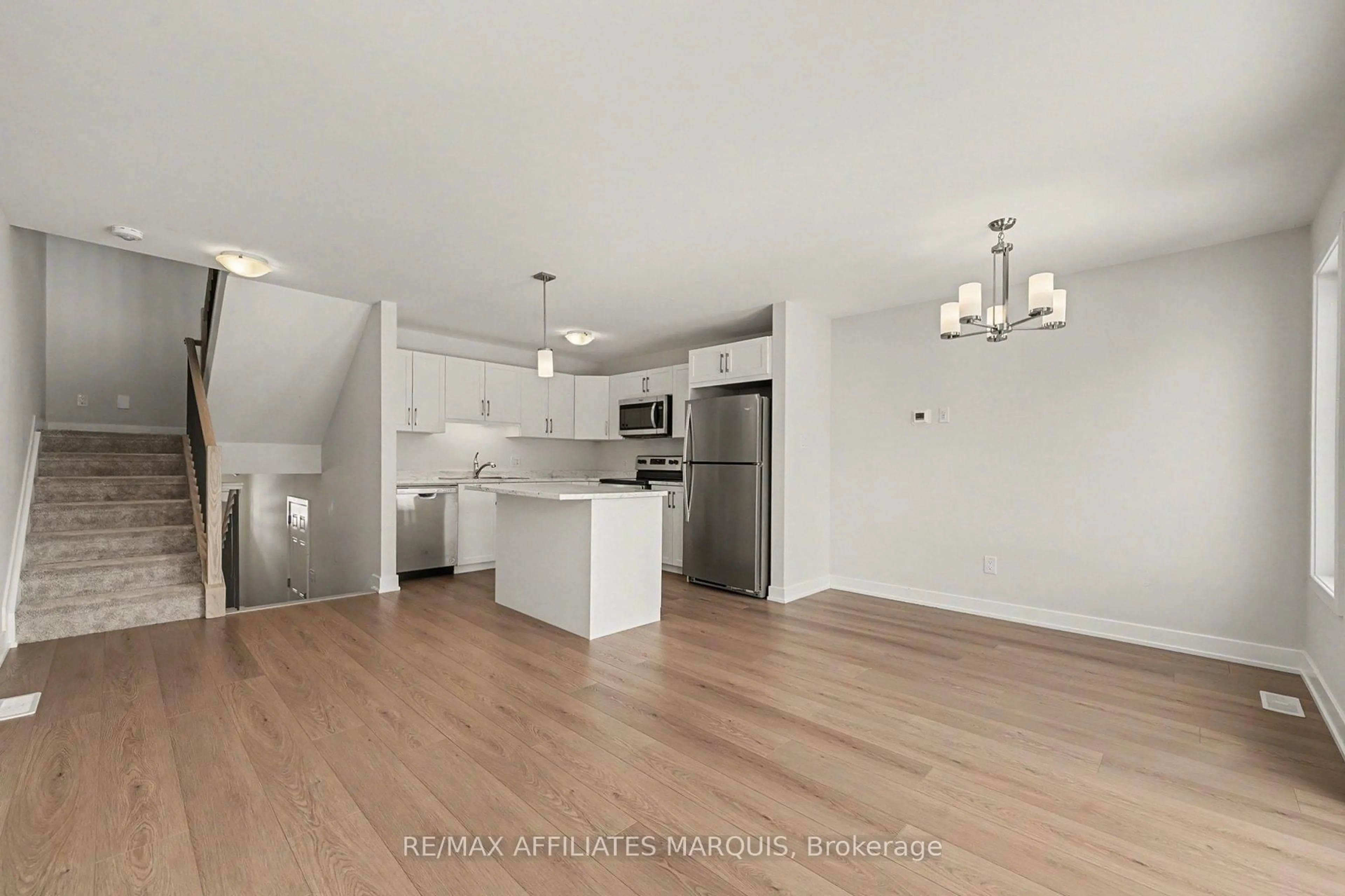 Open concept kitchen, wood/laminate floor for 97 Whitcomb Cres, Smiths Falls Ontario K7A 2B4