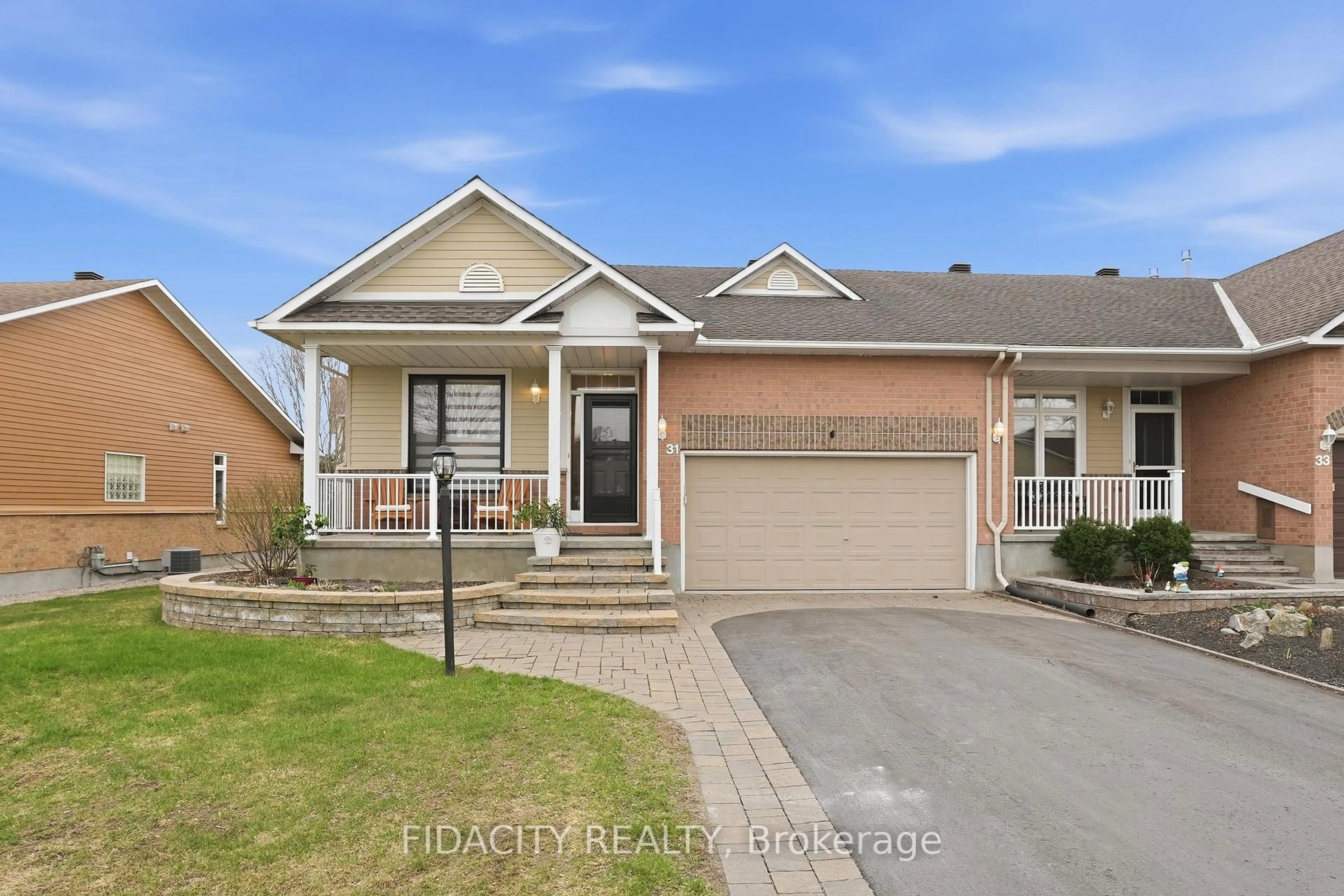 Home with brick exterior material, street for 31 Sable Run Dr, Stittsville Ontario K2S 1W8