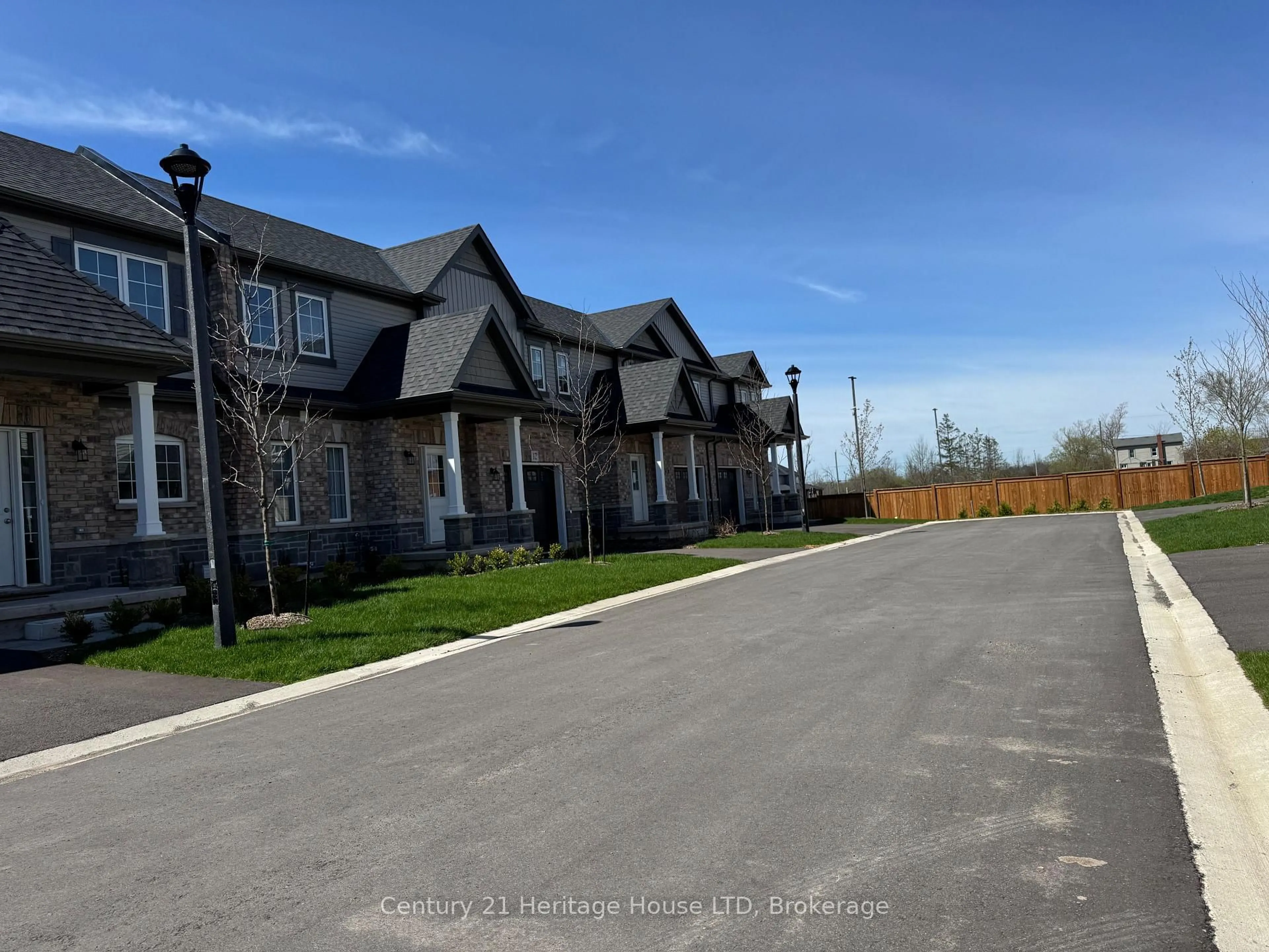 A pic from outside/outdoor area/front of a property/back of a property/a pic from drone, street for 397 Garrison Rd #13, Fort Erie Ontario L2A 1N1