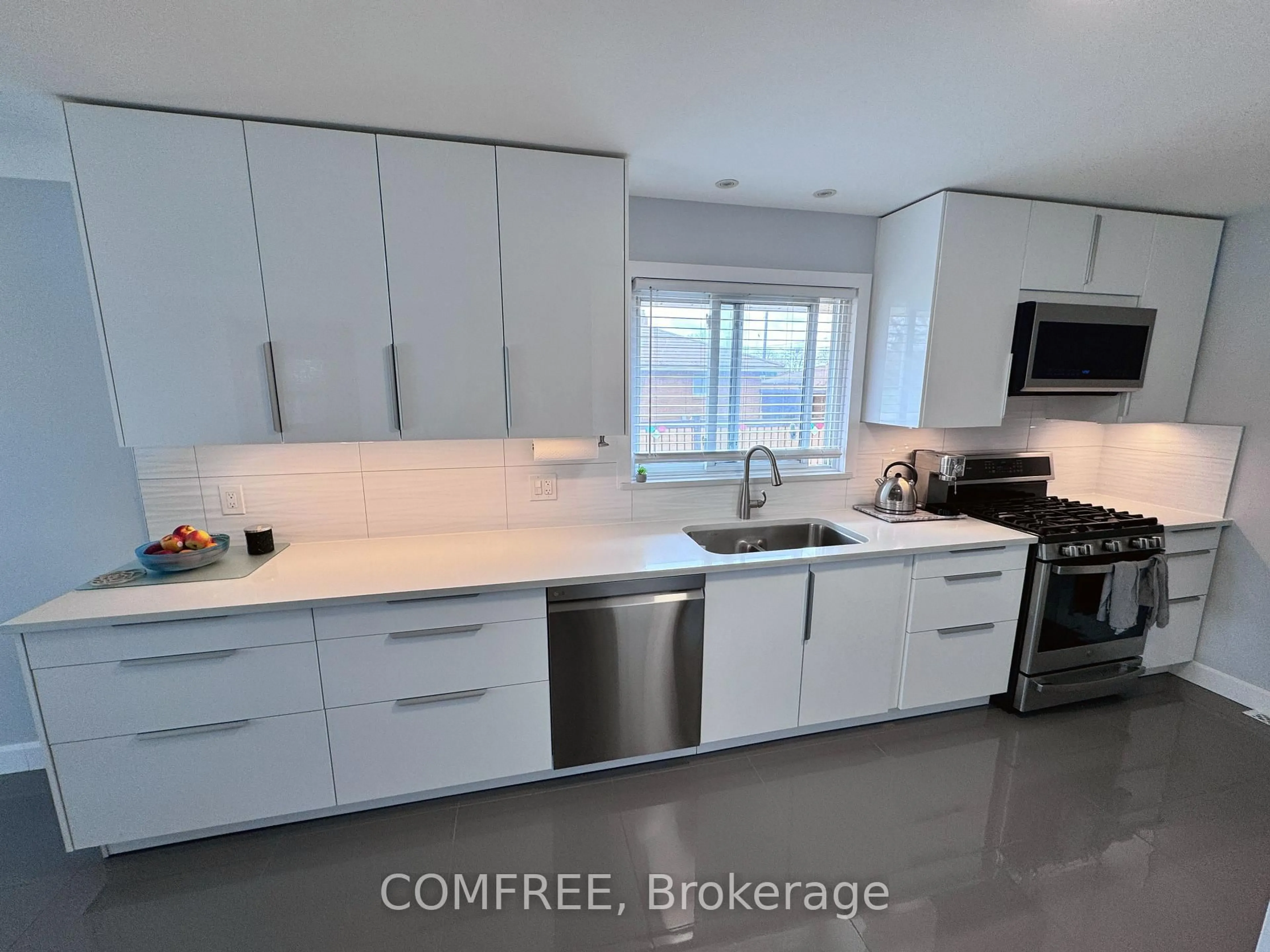 Open concept kitchen, ceramic/tile floor for 2387 Westcott Rd, Windsor Ontario N8W 4K6