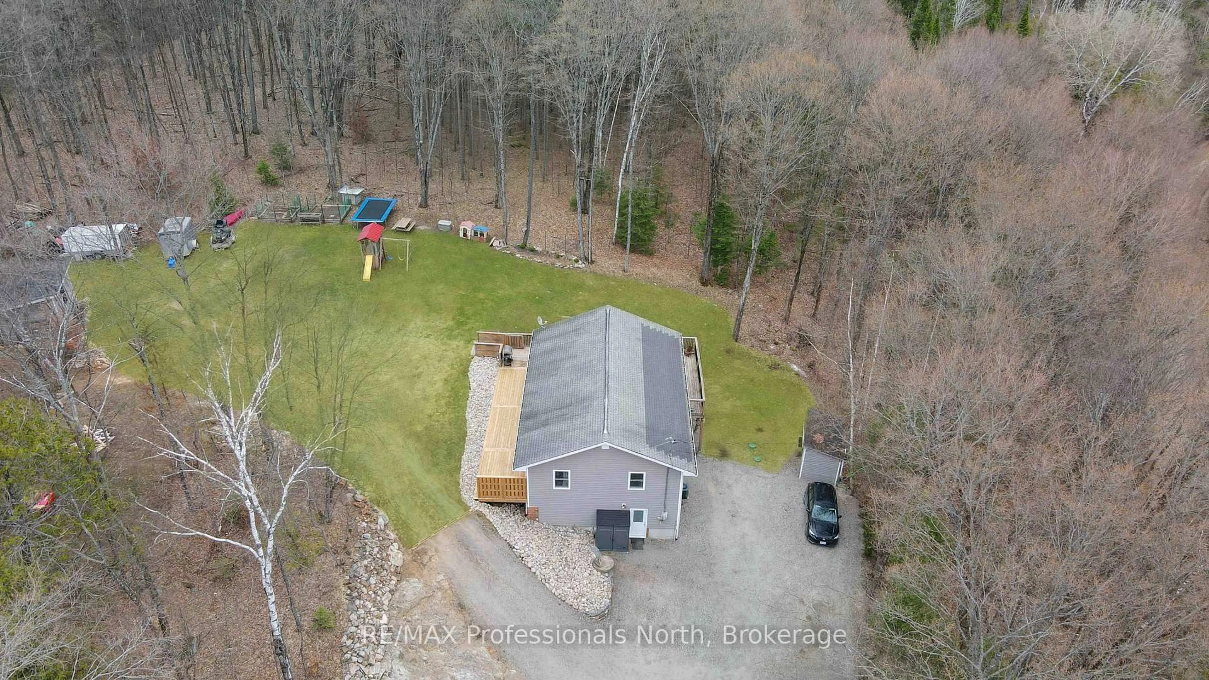 A pic from outside/outdoor area/front of a property/back of a property/a pic from drone, building for 1310 Alexander Rd, Minden Hills Ontario K0M 2K0