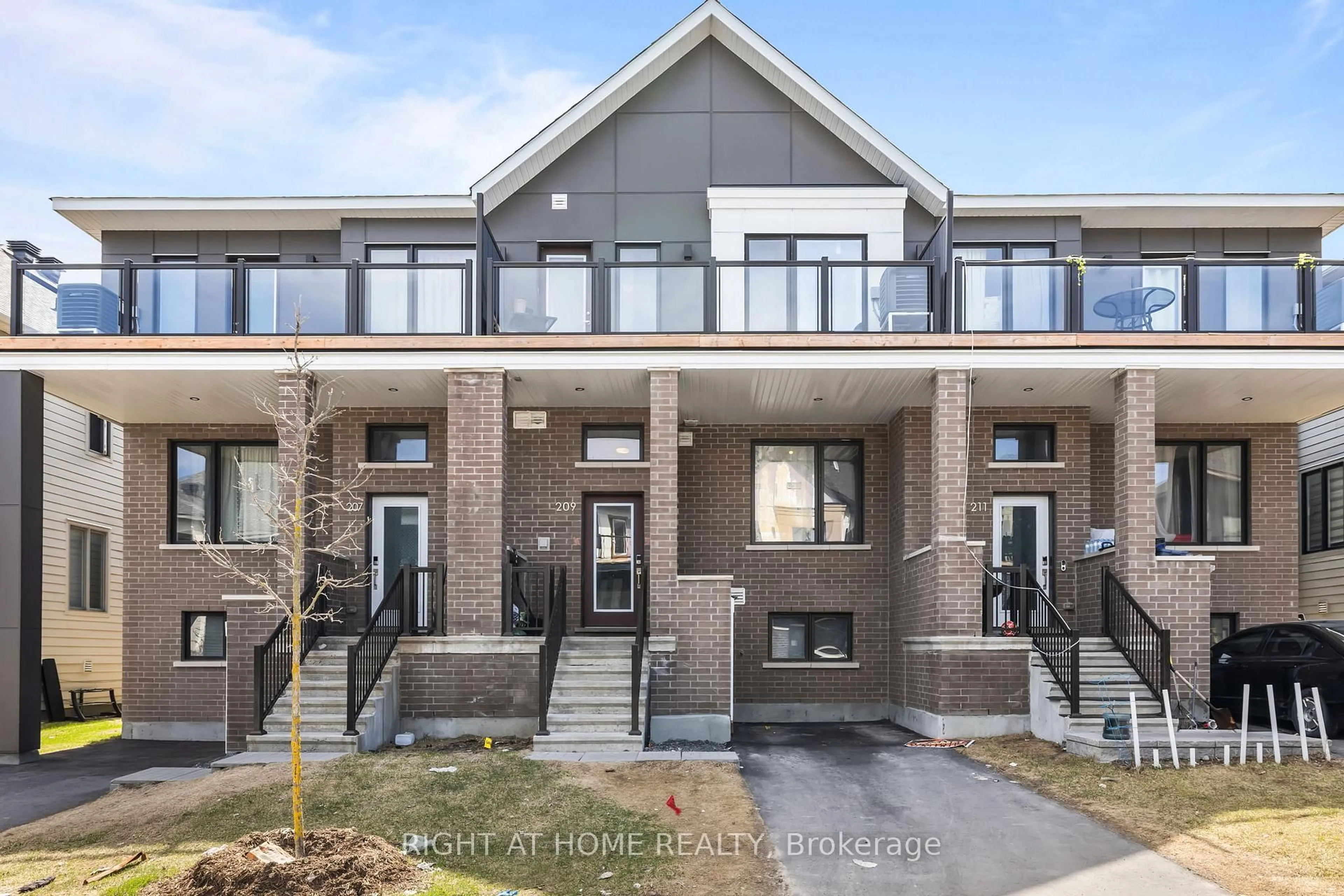 Home with brick exterior material, street for 209 Speckled Alder Row, Ottawa Ontario K2J 7G8