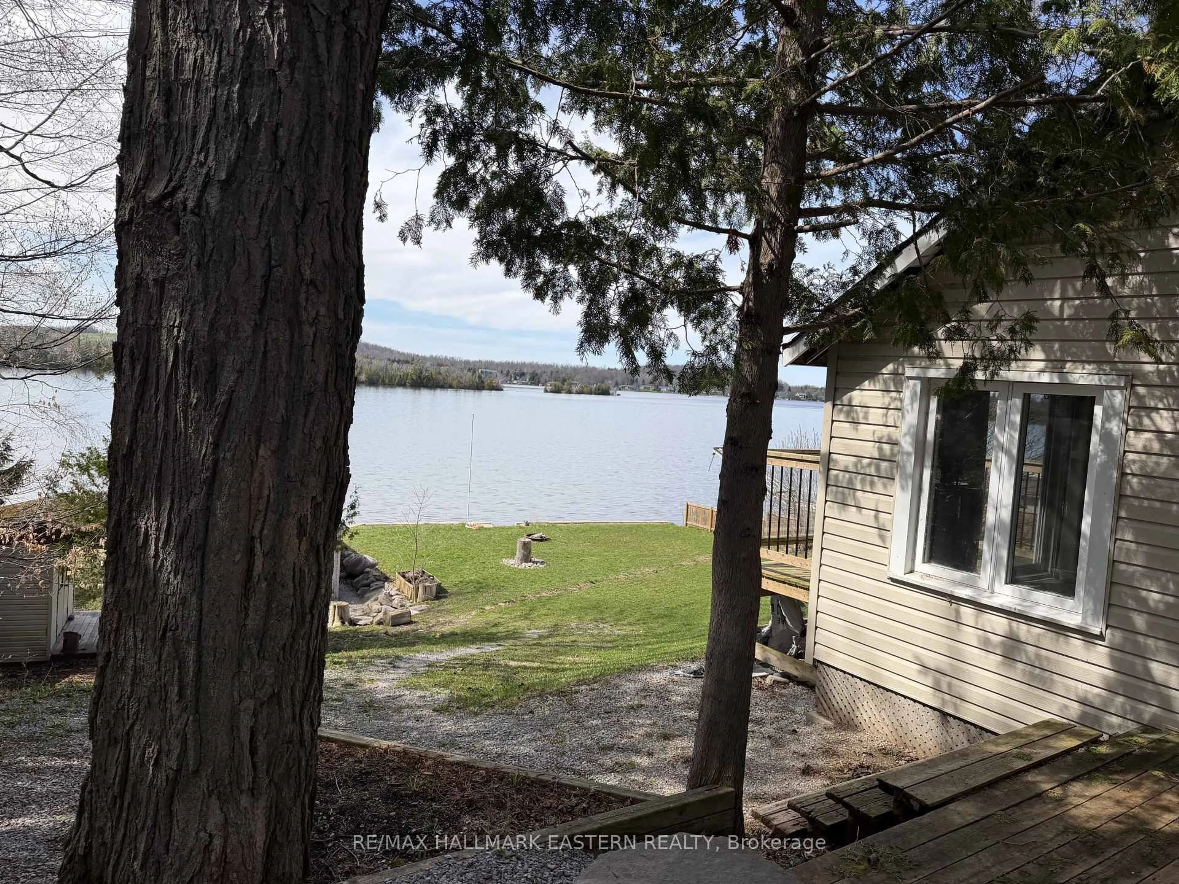 A pic from outside/outdoor area/front of a property/back of a property/a pic from drone, water/lake/river/ocean view for 344 Fife Ave, Selwyn Ontario K9J 6X3