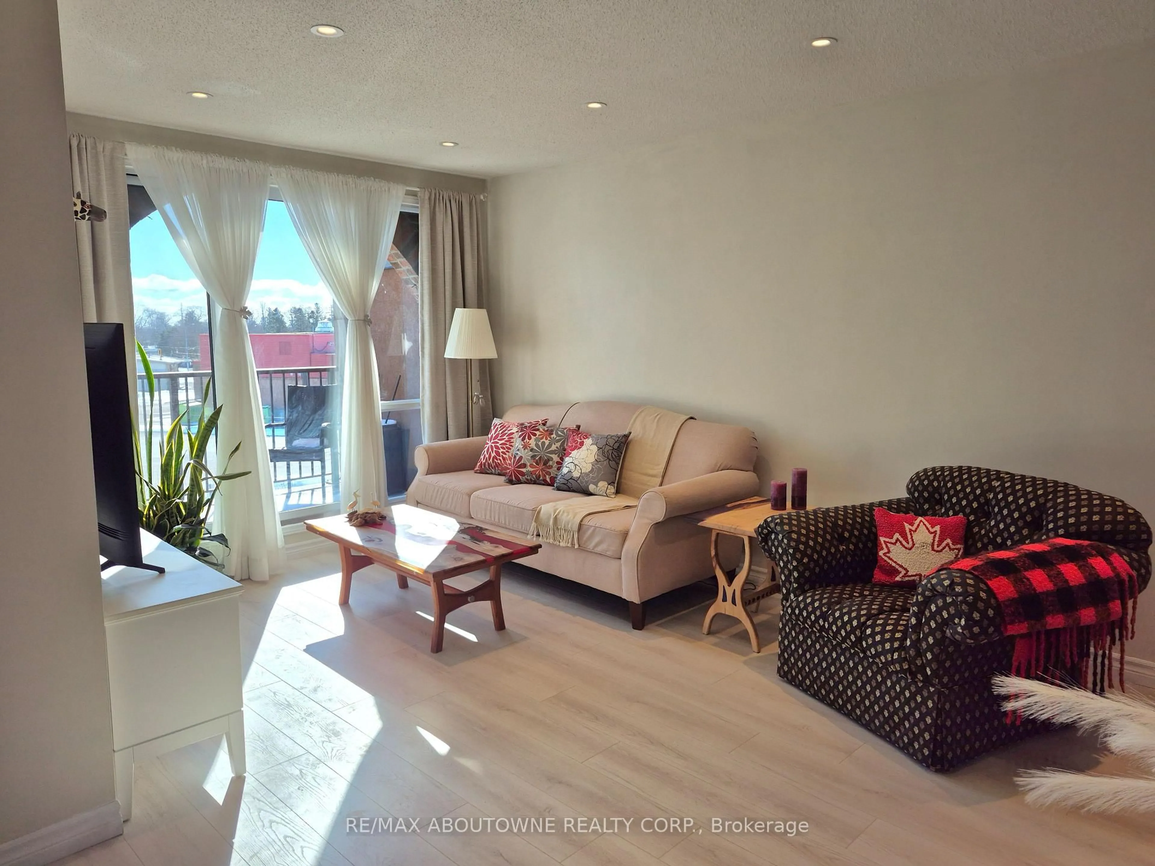 Living room with furniture, unknown for 36 Hayhurst Rd #334, Brantford Ontario N3R 6Y9