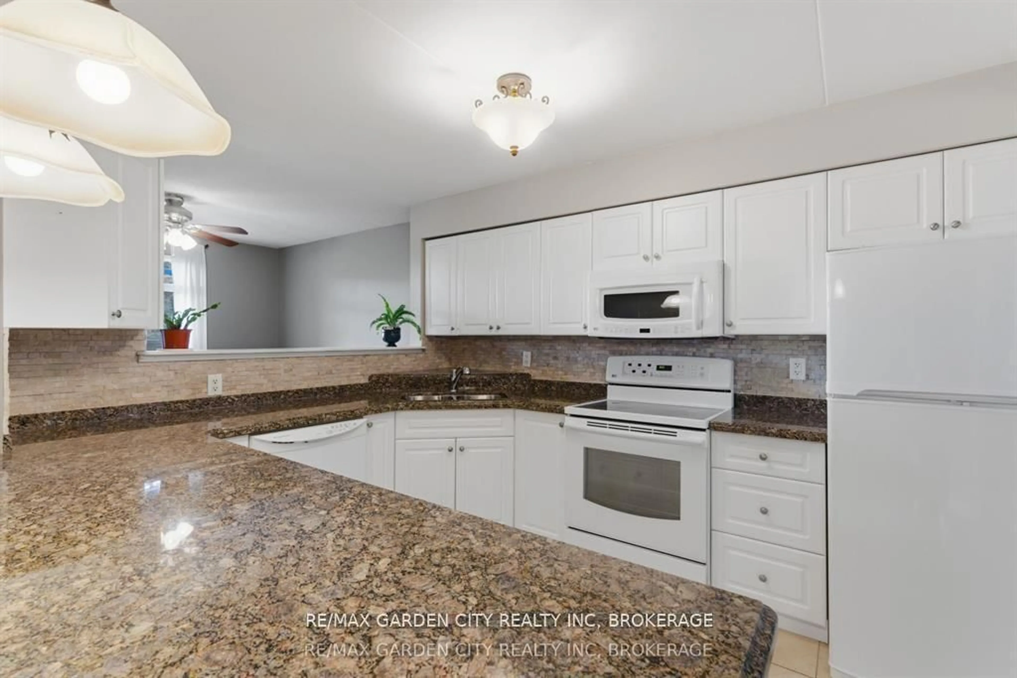 Standard kitchen, ceramic/tile floor for 4658 Drummond Rd #230, Niagara Falls Ontario L2E 7E1