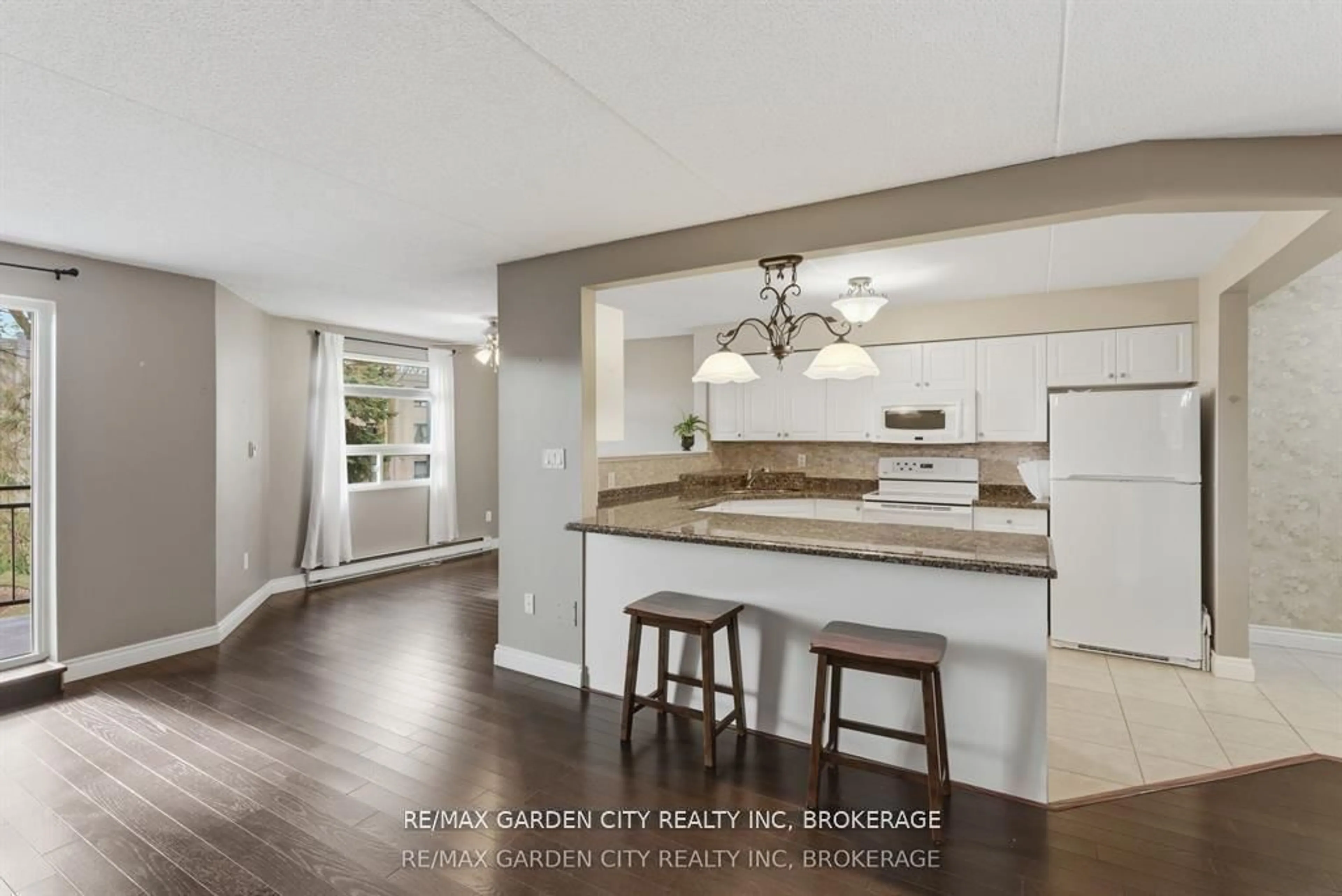 Open concept kitchen, unknown for 4658 Drummond Rd #230, Niagara Falls Ontario L2E 7E1
