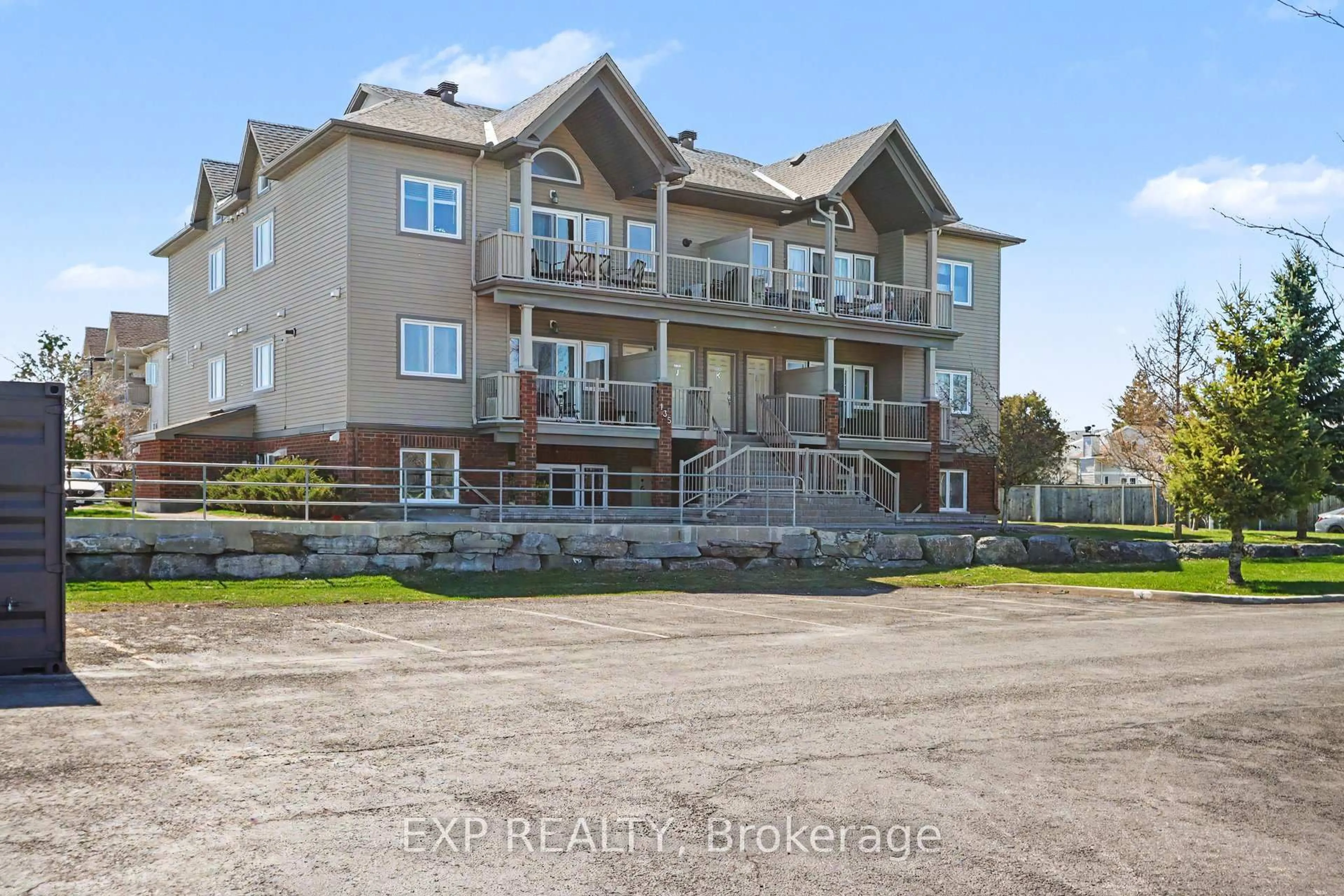A pic from outside/outdoor area/front of a property/back of a property/a pic from drone, unknown for 135 Harthill Way #J, Ottawa Ontario K2J 5V1
