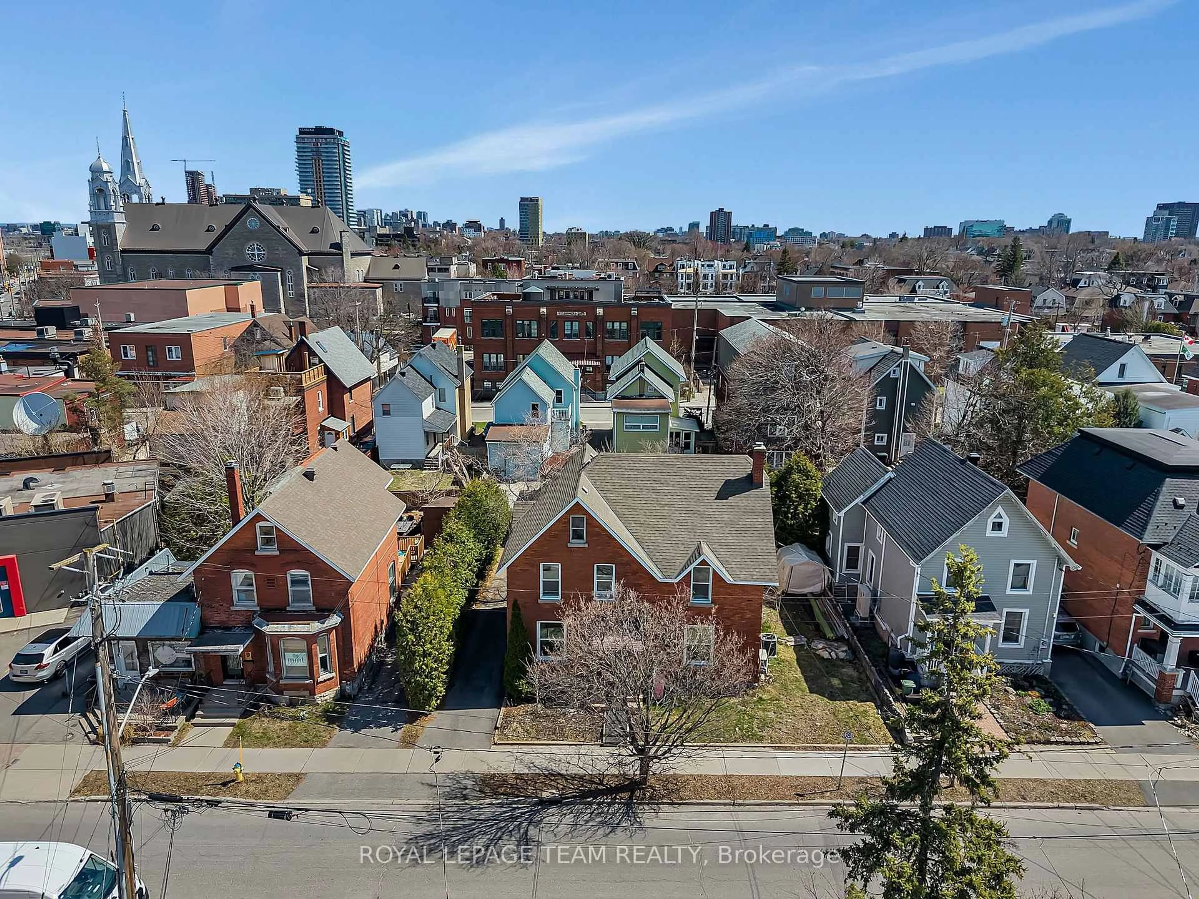 A pic from outside/outdoor area/front of a property/back of a property/a pic from drone, city buildings view from balcony for 11 Sherbrooke Ave, Ottawa Ontario K1Y 1R8