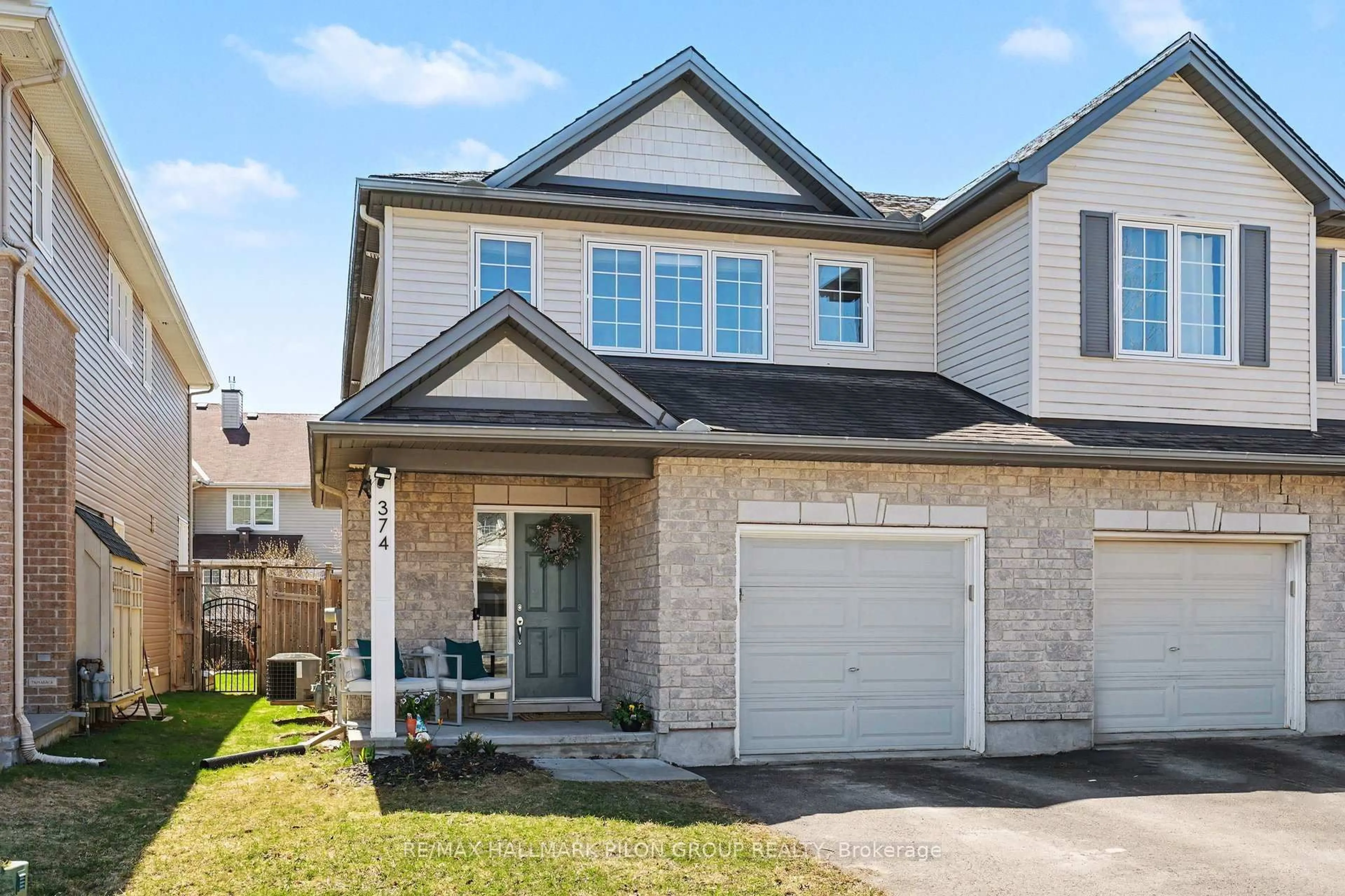 Home with brick exterior material, street for 374 Horseshoe Cres, Stittsville Ontario K2S 0B5