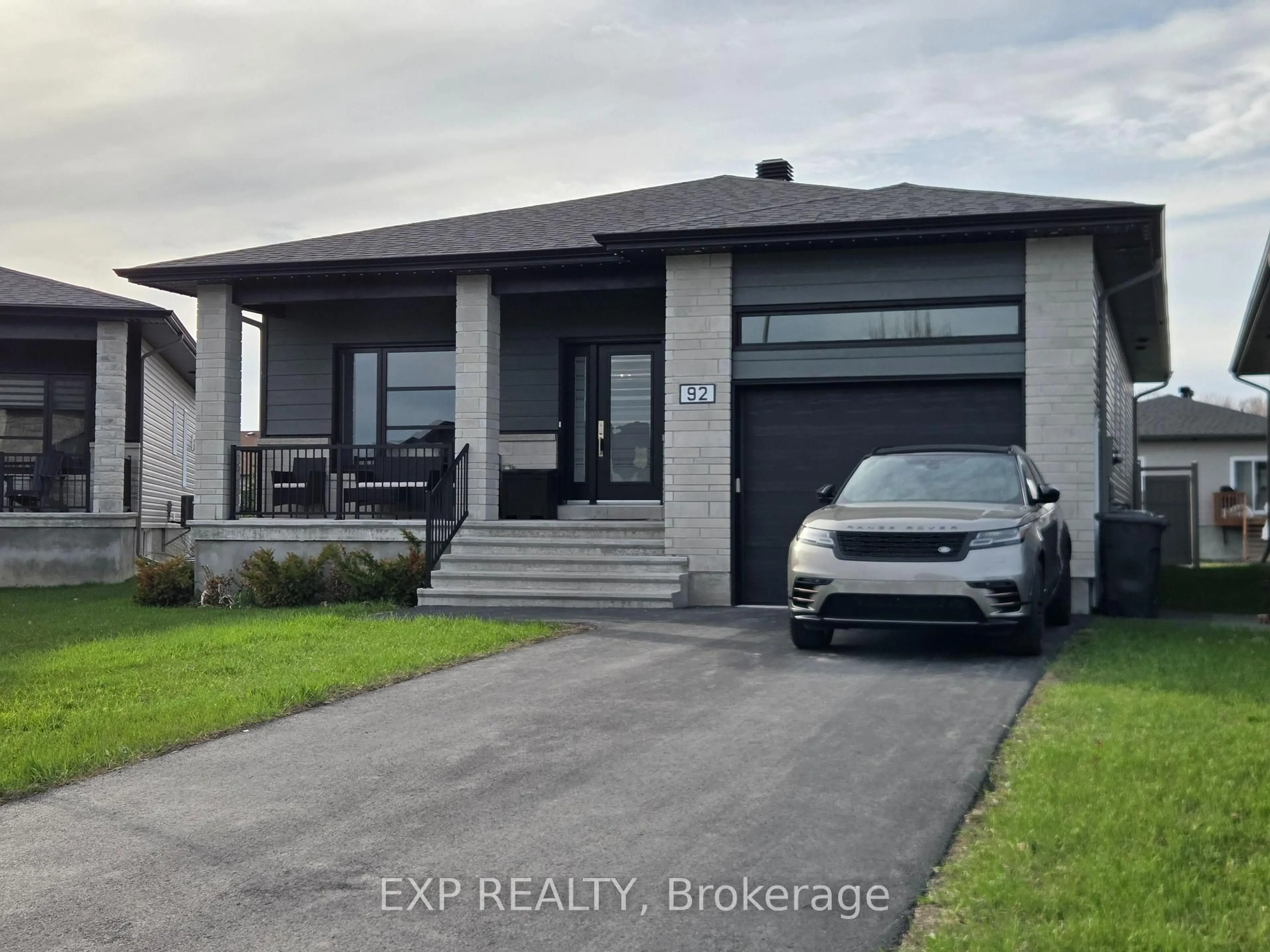 Home with vinyl exterior material, street for 92 Chateauguay St, Russell Ontario K0A 1W0