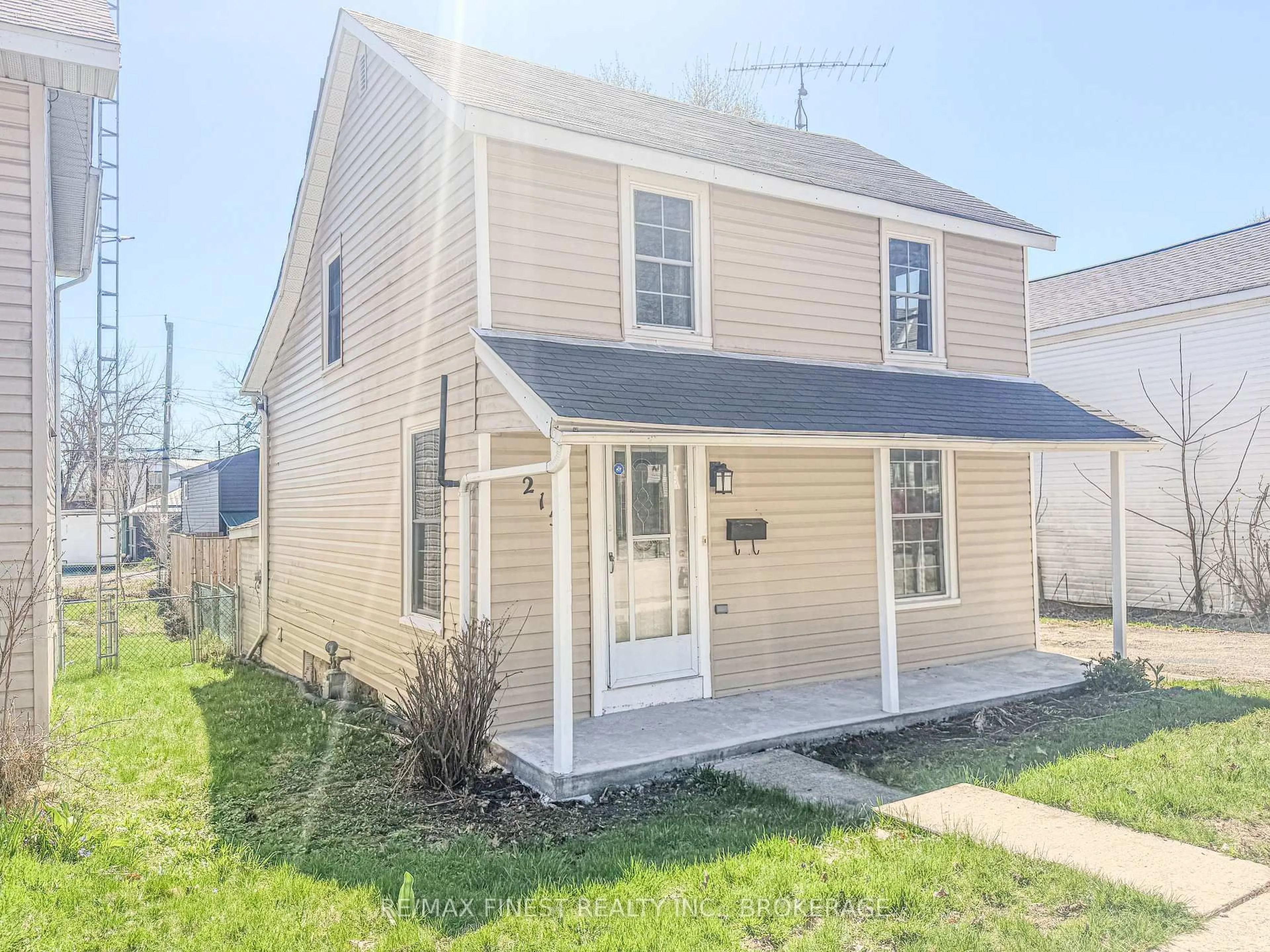 Home with vinyl exterior material, street for 215 Brock St, Gananoque Ontario K7G 1G5