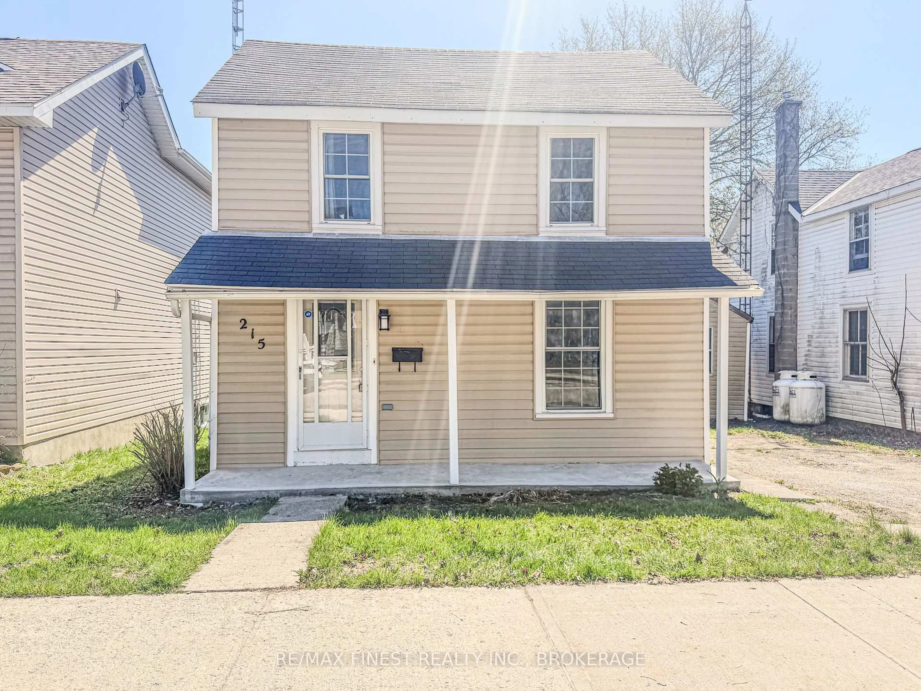 Home with vinyl exterior material, street for 215 Brock St, Gananoque Ontario K7G 1G5