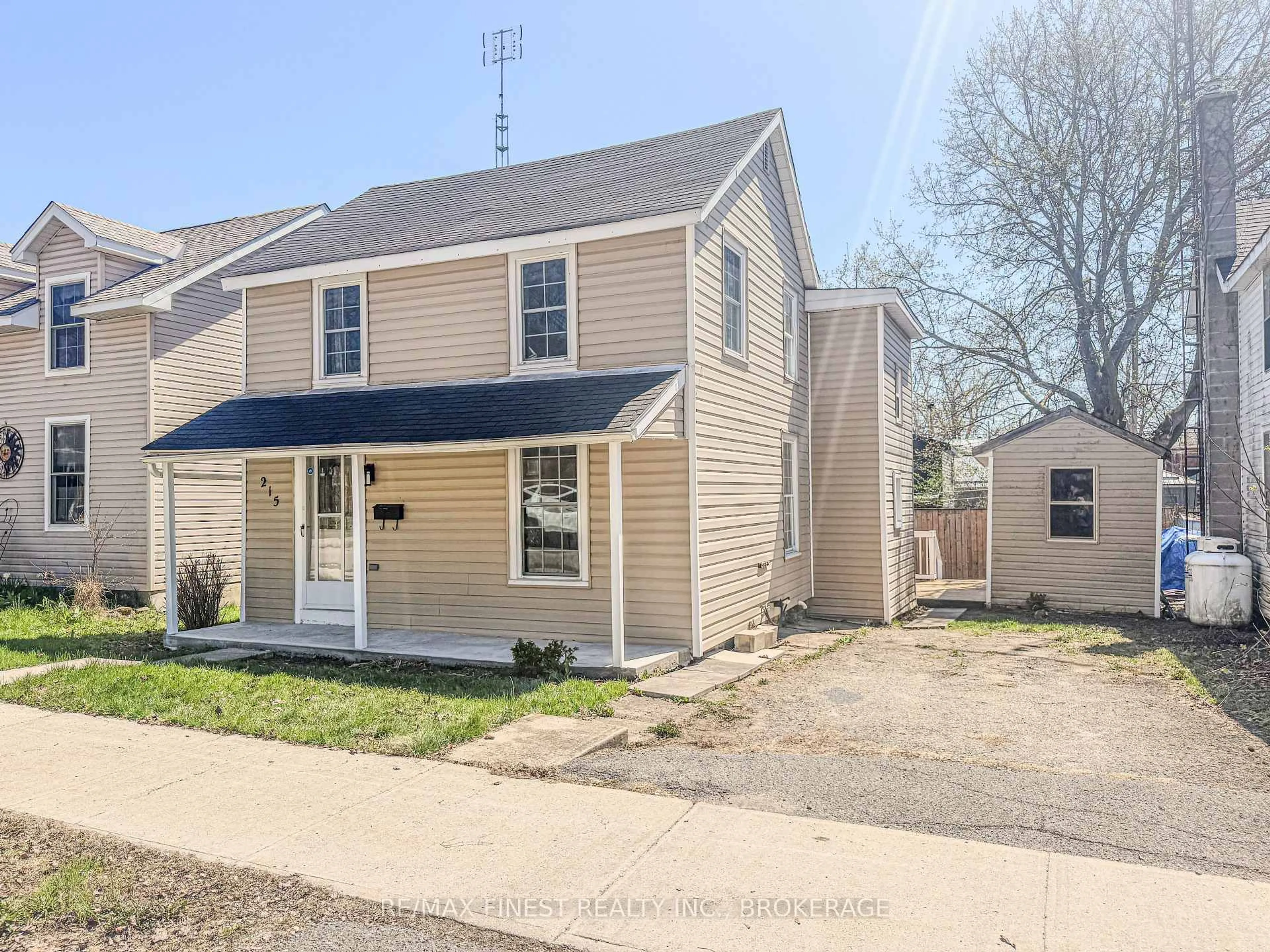 Home with vinyl exterior material, street for 215 Brock St, Gananoque Ontario K7G 1G5