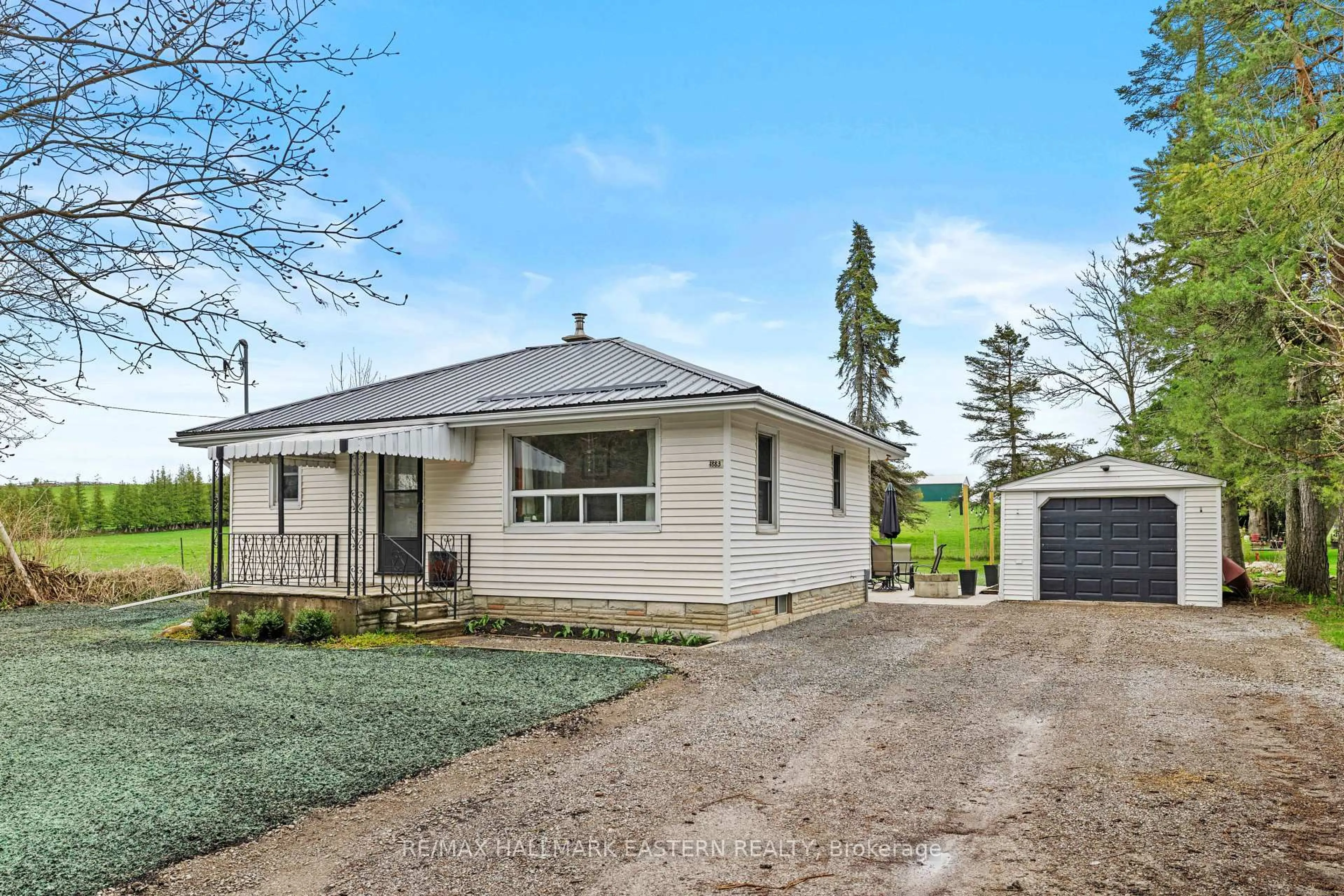A pic from outside/outdoor area/front of a property/back of a property/a pic from drone, unknown for 1883 Twelfth Line, Selwyn Ontario K0L 2H0
