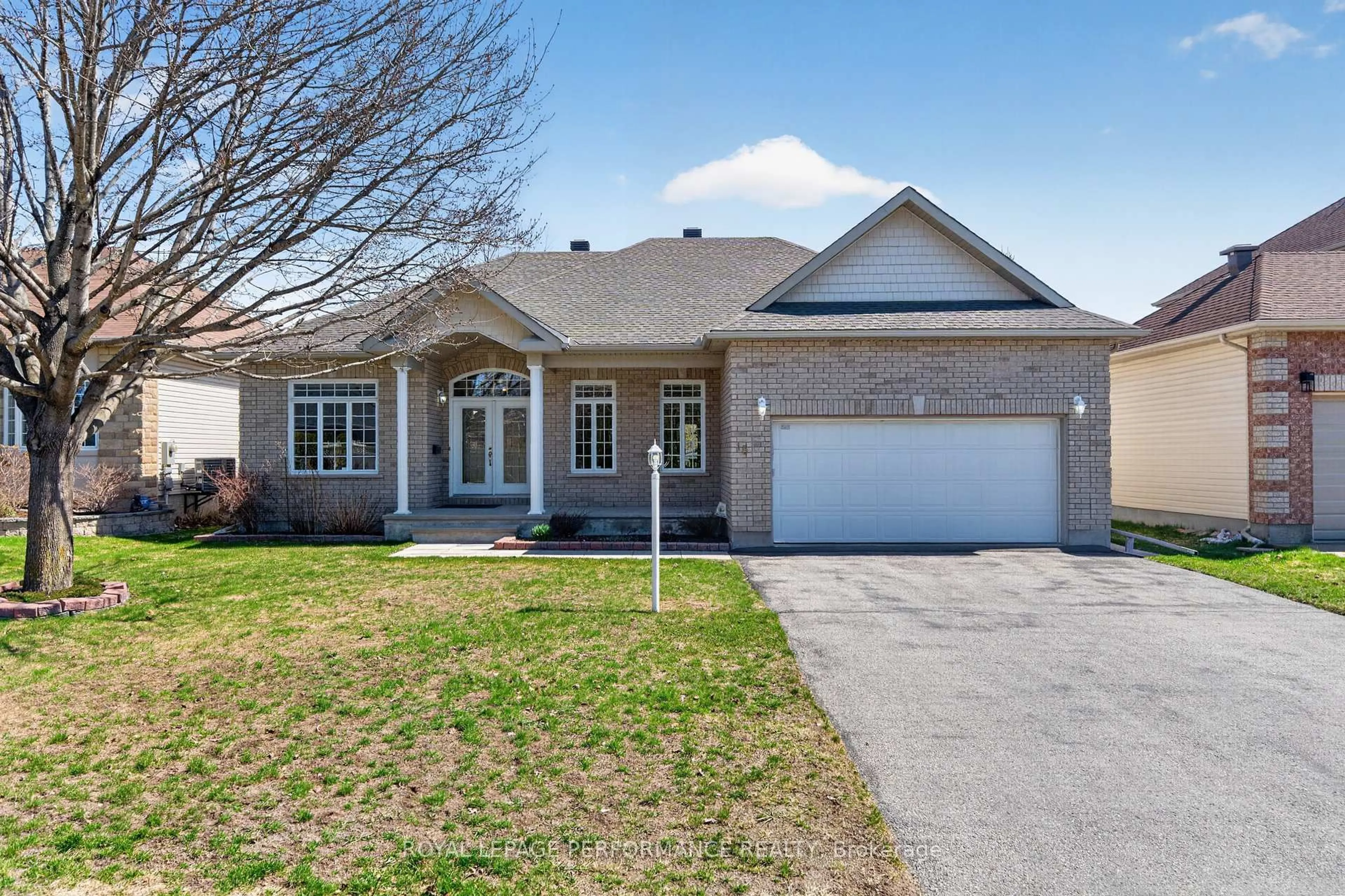 Home with brick exterior material, street for 18 Hartsmere Dr, Ottawa Ontario K2S 1K2