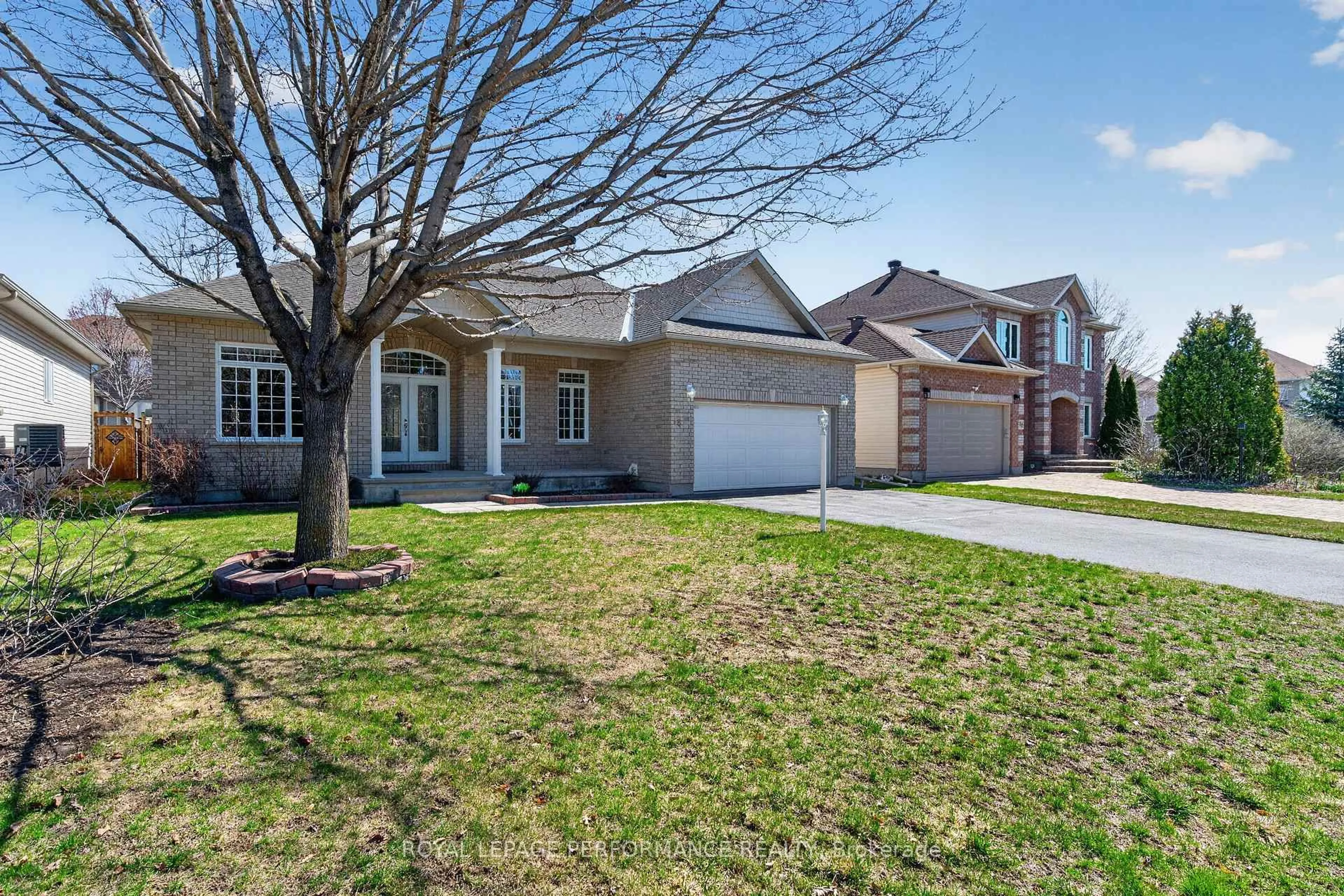 Home with brick exterior material, street for 18 Hartsmere Dr, Ottawa Ontario K2S 1K2