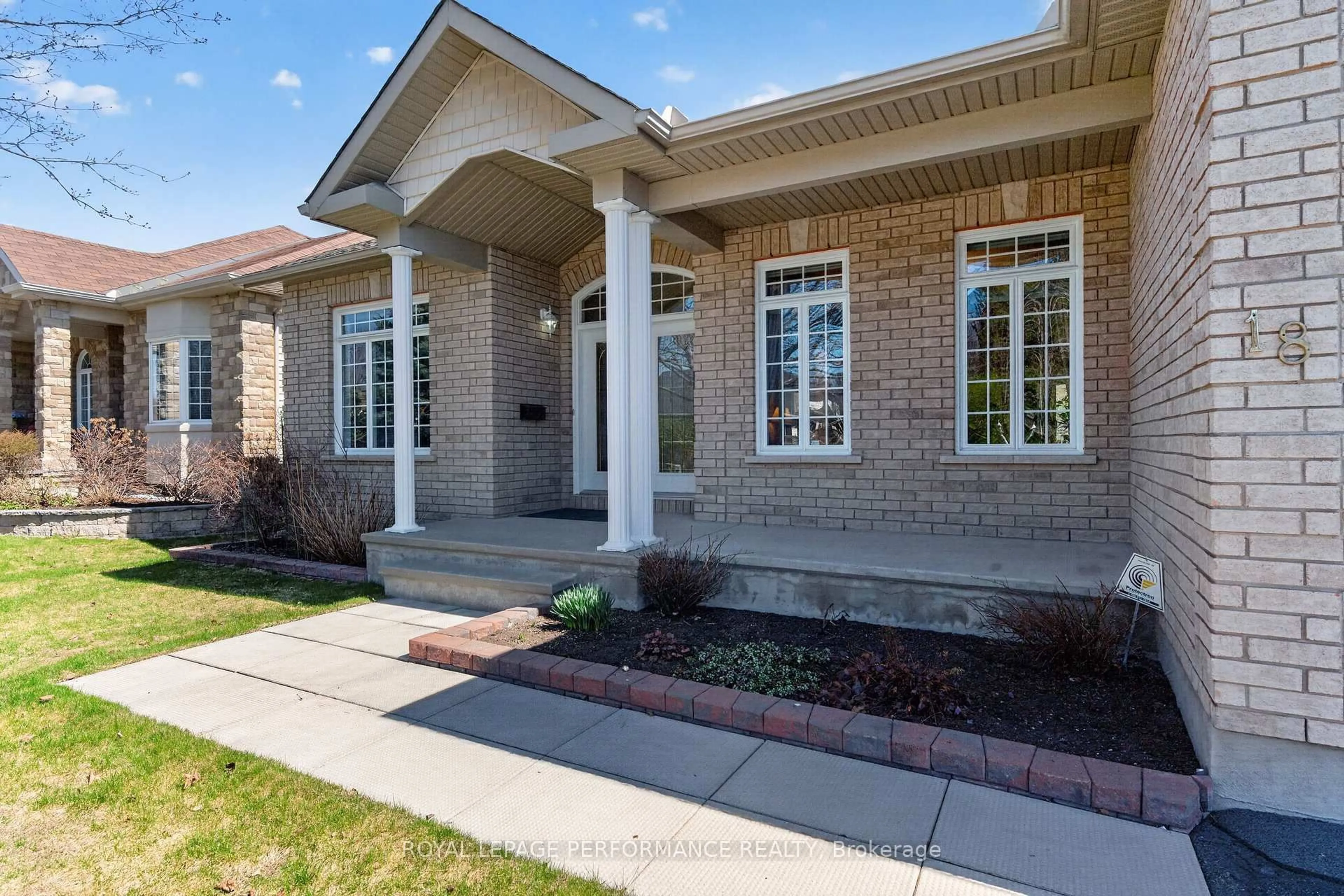 Home with brick exterior material, street for 18 Hartsmere Dr, Ottawa Ontario K2S 1K2