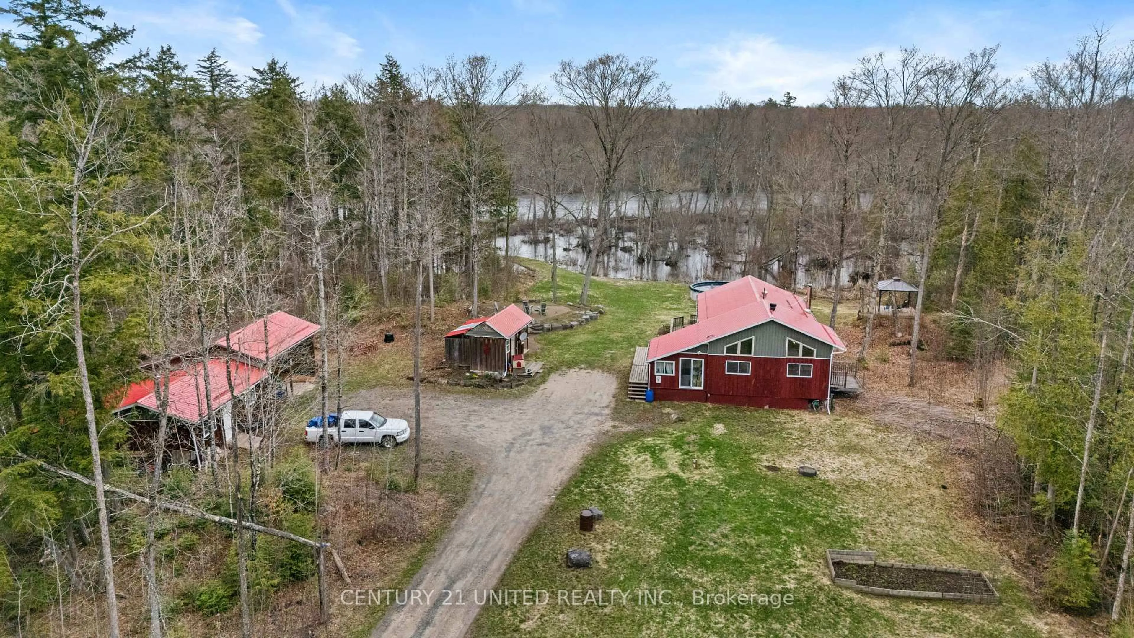 A pic from outside/outdoor area/front of a property/back of a property/a pic from drone, water/lake/river/ocean view for 1612 Shanick Rd, Limoges Ontario K0K 2M0