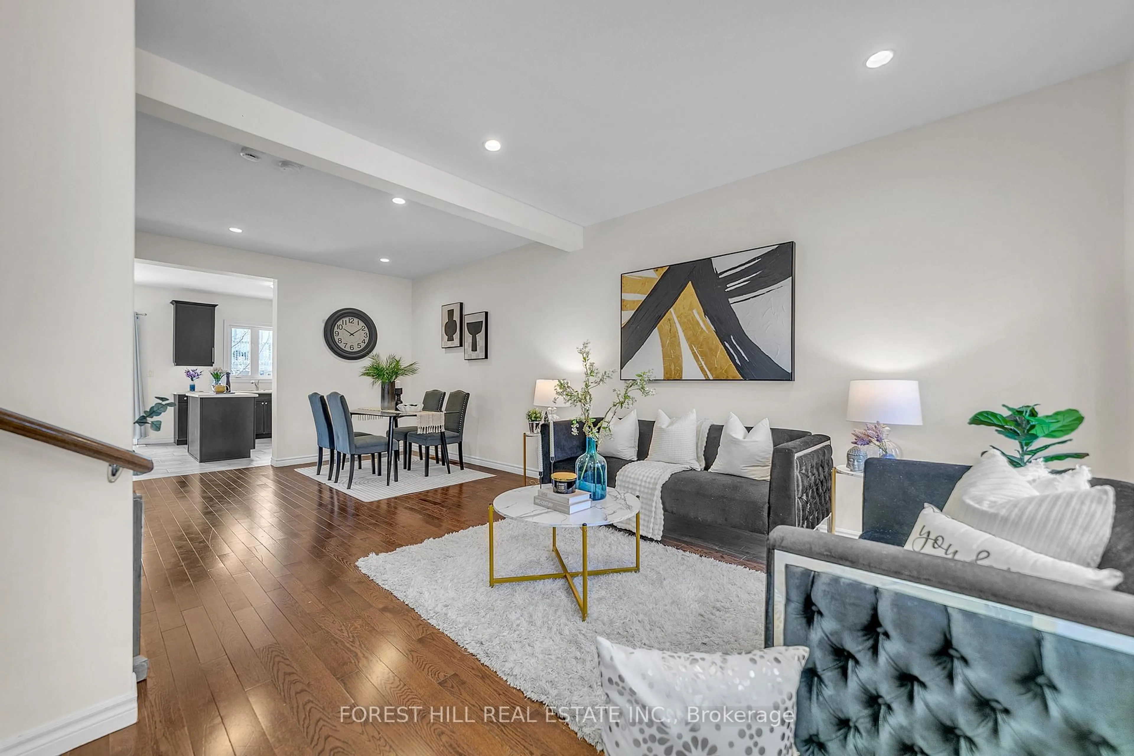 Living room with furniture, wood/laminate floor for 3320 Meadowgate Blvd #134, London South Ontario N6M 0A7