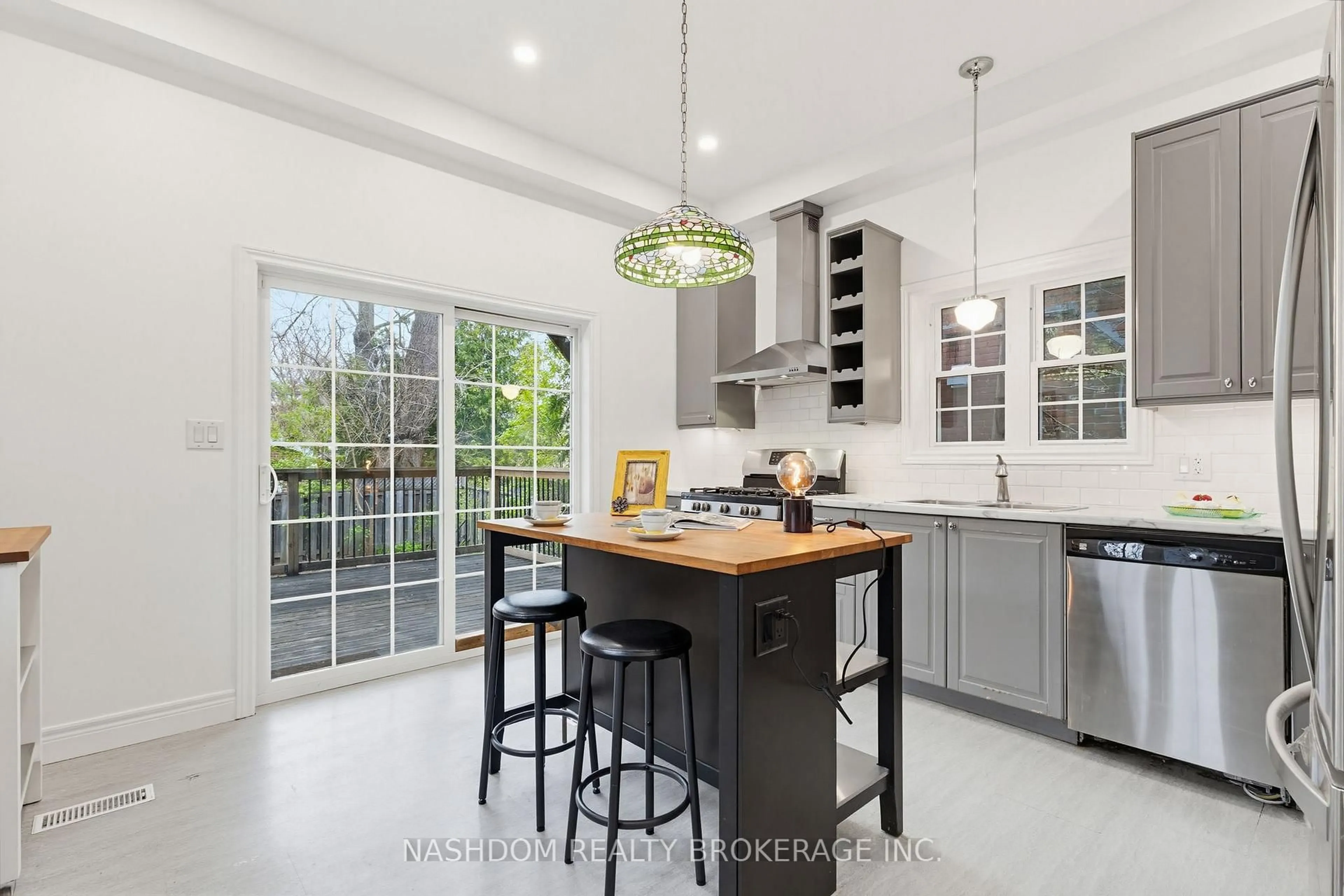 Open concept kitchen, ceramic/tile floor for 42 Erie Ave, Hamilton Ontario L8N 2W6