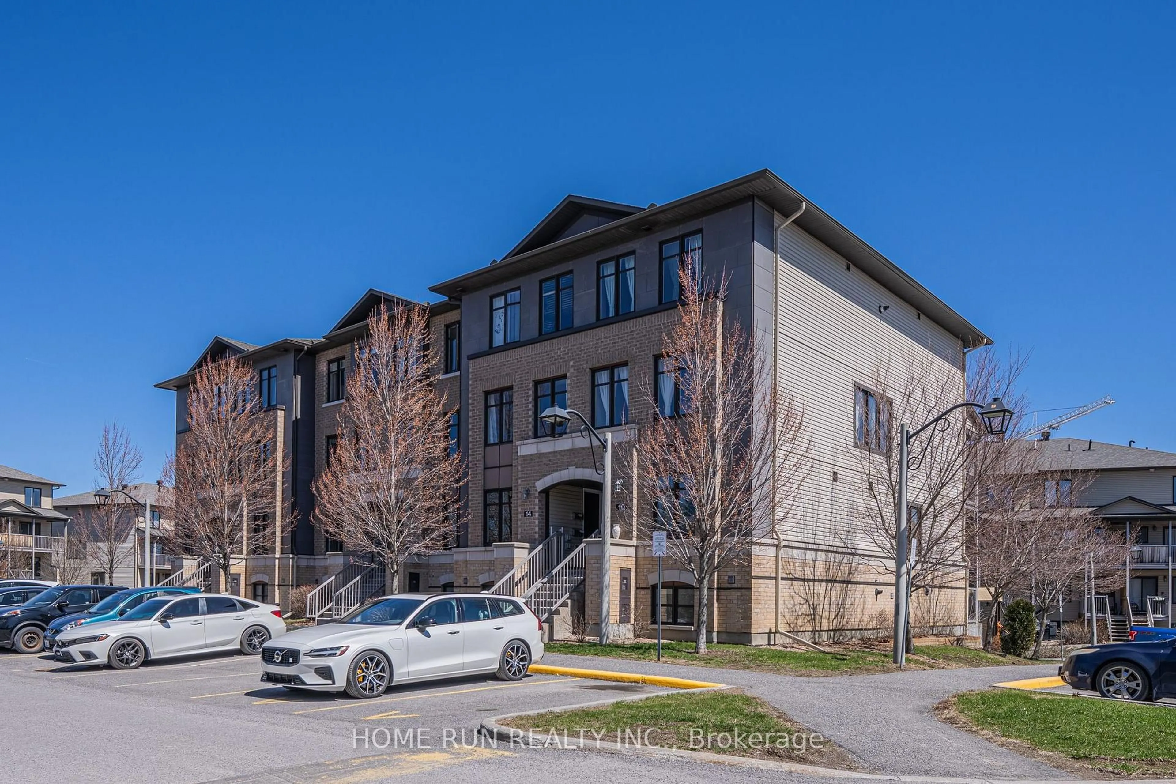 A pic from outside/outdoor area/front of a property/back of a property/a pic from drone, unknown for 12 Argent Private #20, Ottawa Ontario K2K 0H2