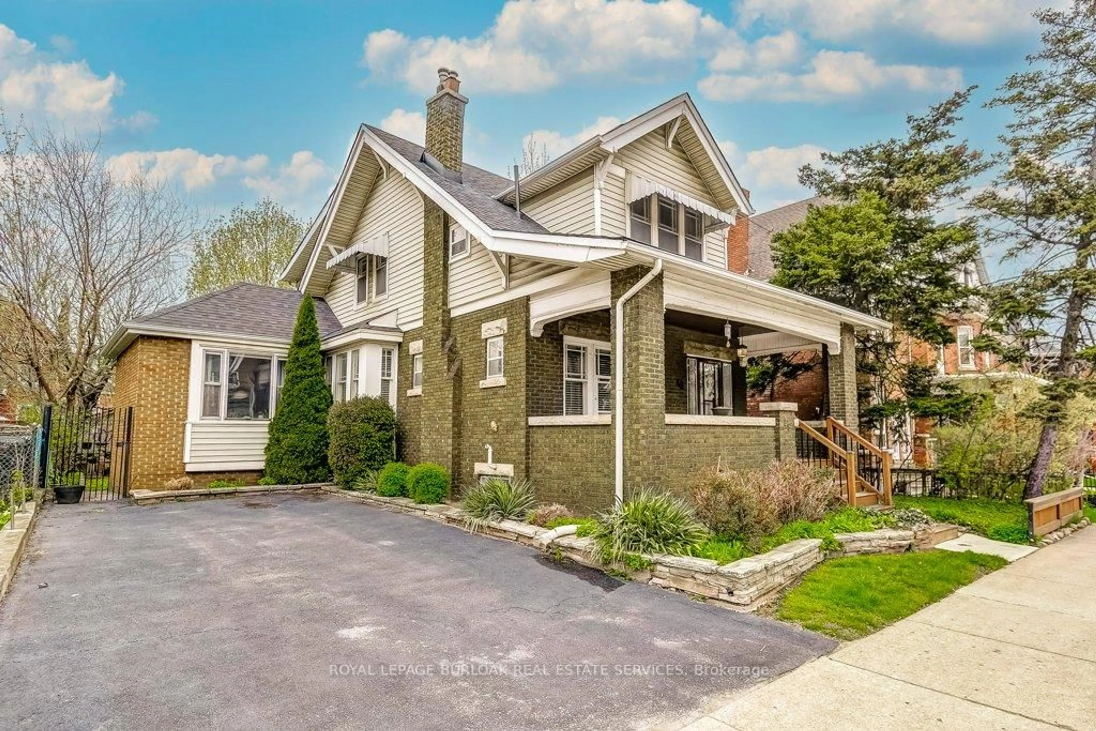 Home with brick exterior material, street for 46 Sherman Ave, Hamilton Ontario L8M 2P4