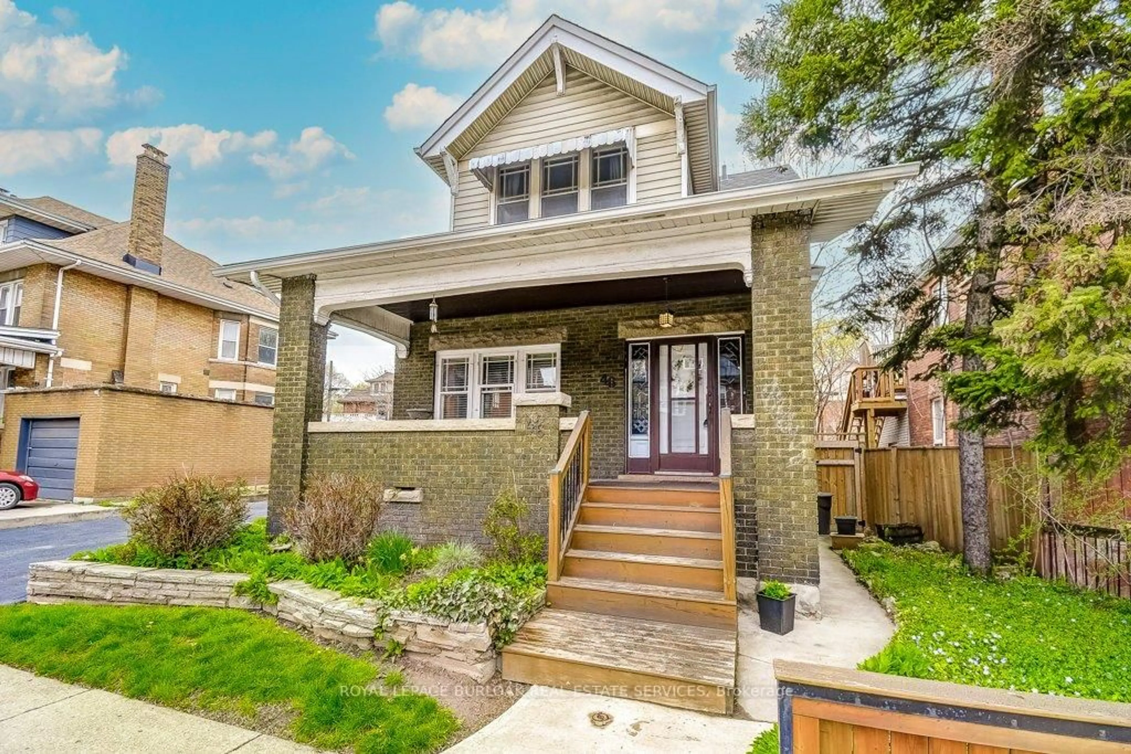 Home with brick exterior material, street for 46 Sherman Ave, Hamilton Ontario L8M 2P4