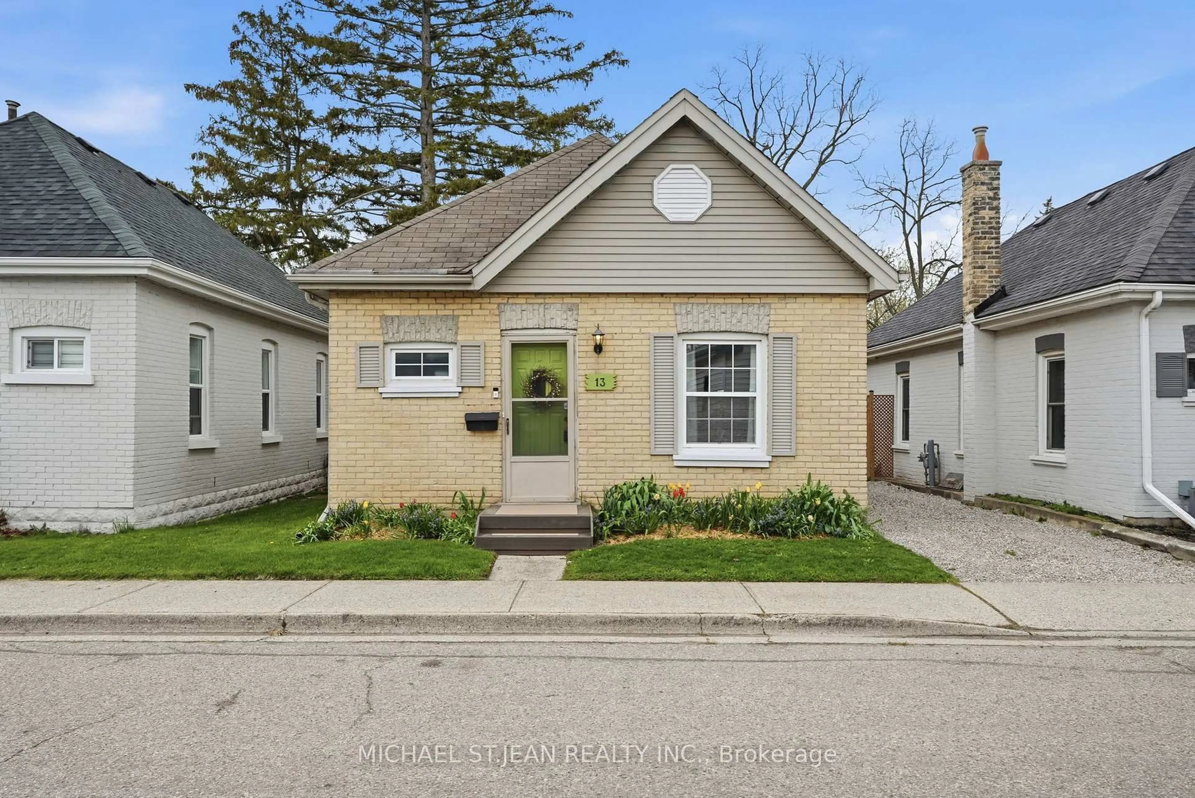 Home with vinyl exterior material, street for 13 Gordon St, Brantford Ontario N3S 2M7