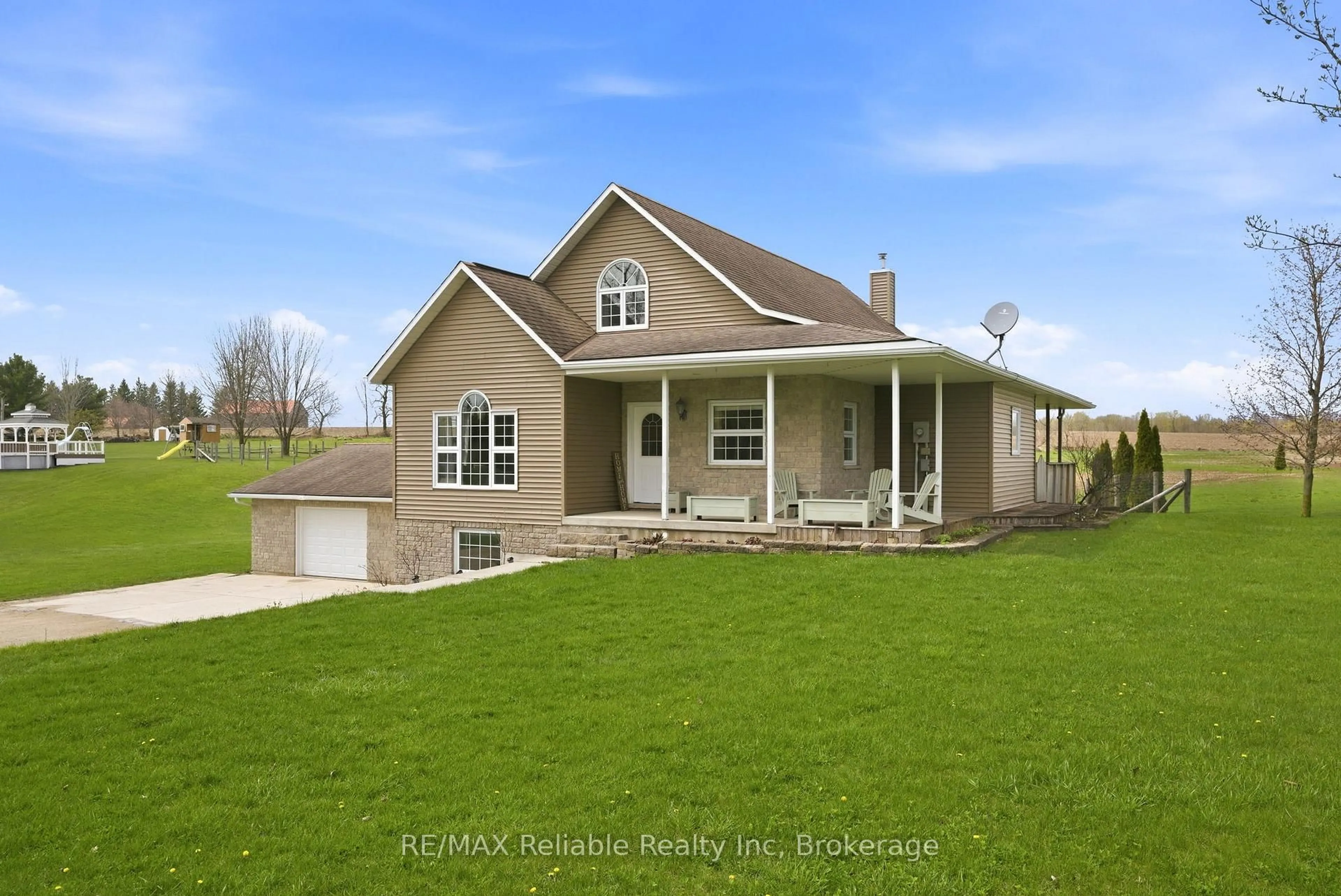 Home with vinyl exterior material, street for 69 Queen St, Morris Turnberry Ontario N0G 1G0
