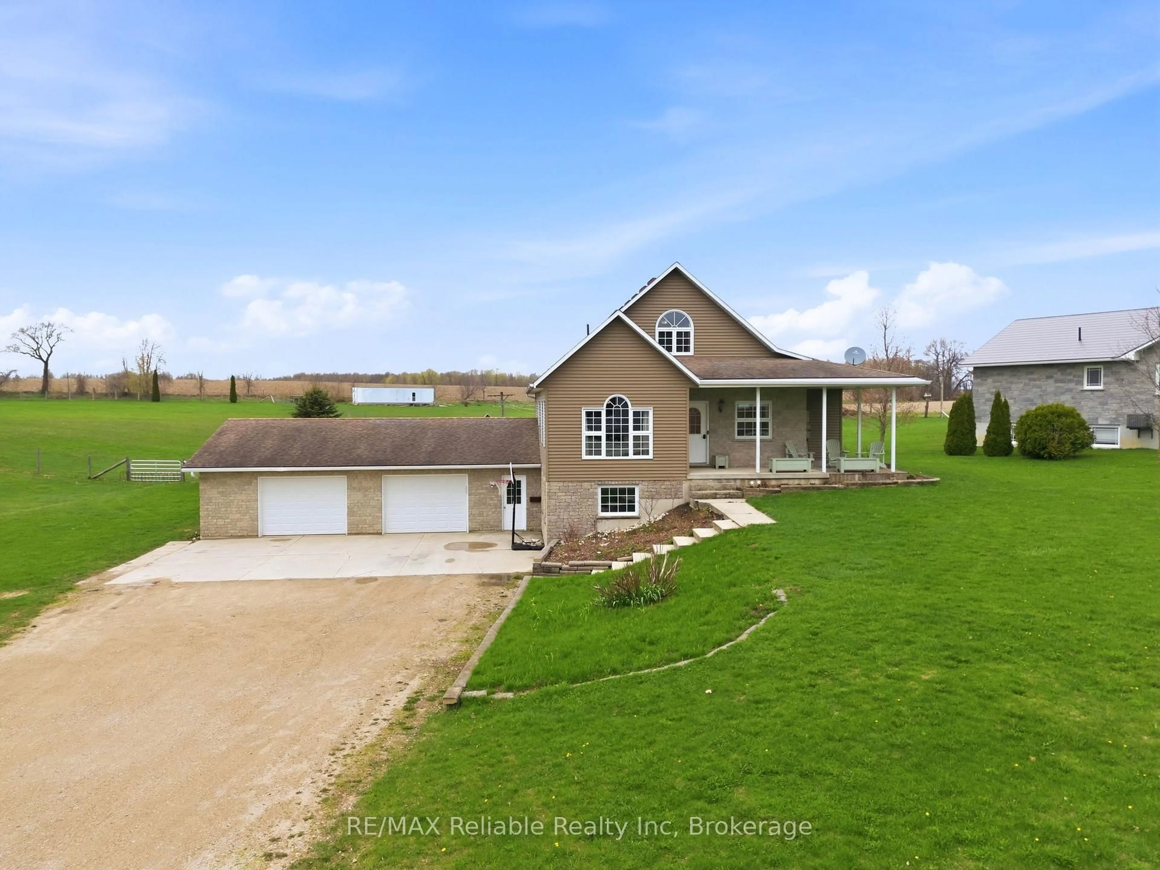 A pic from outside/outdoor area/front of a property/back of a property/a pic from drone, unknown for 69 Queen St, Morris Turnberry Ontario N0G 1G0