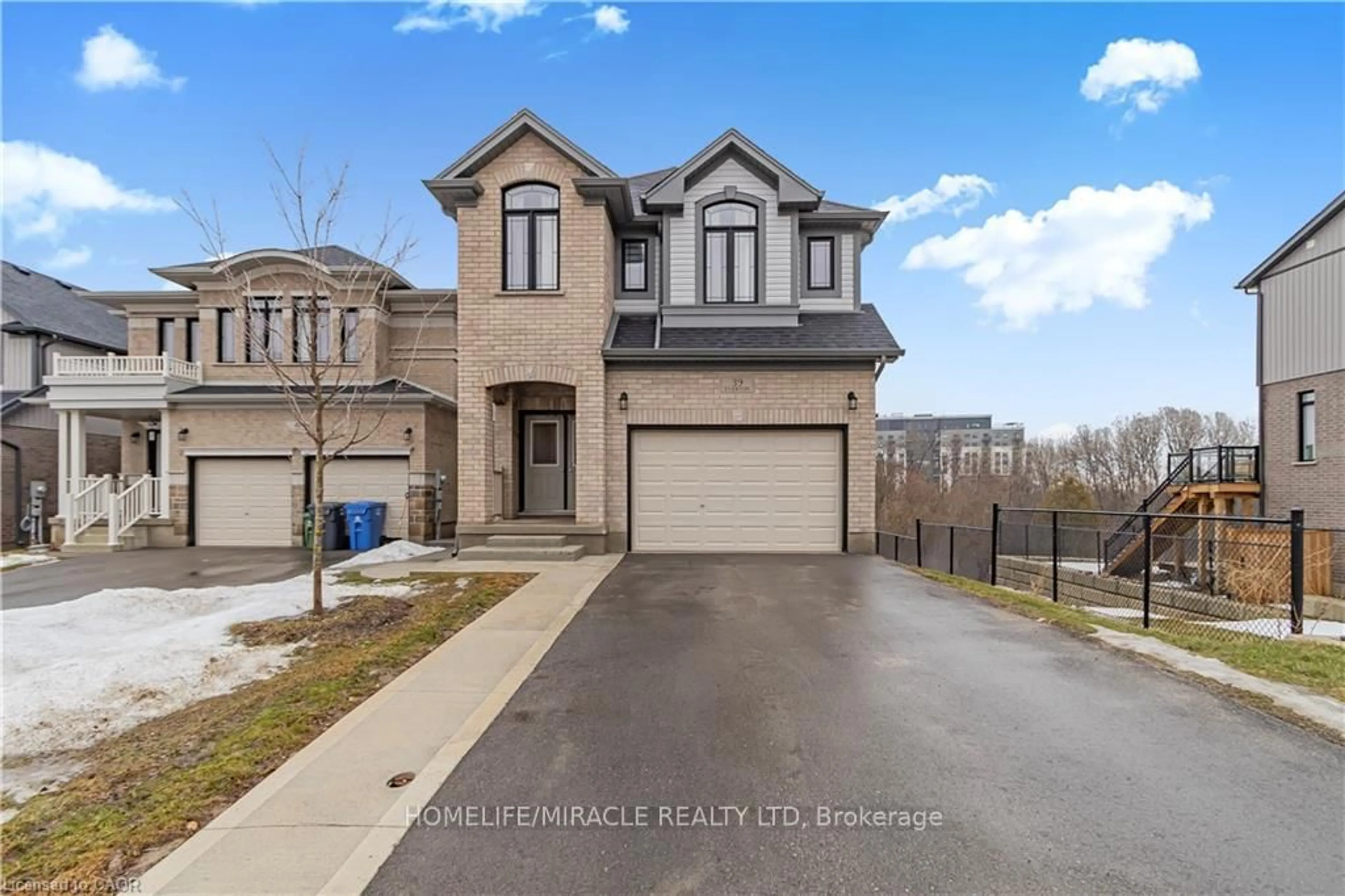 A pic from outside/outdoor area/front of a property/back of a property/a pic from drone, street for 39 Everton Dr, Guelph Ontario N1E 0R9
