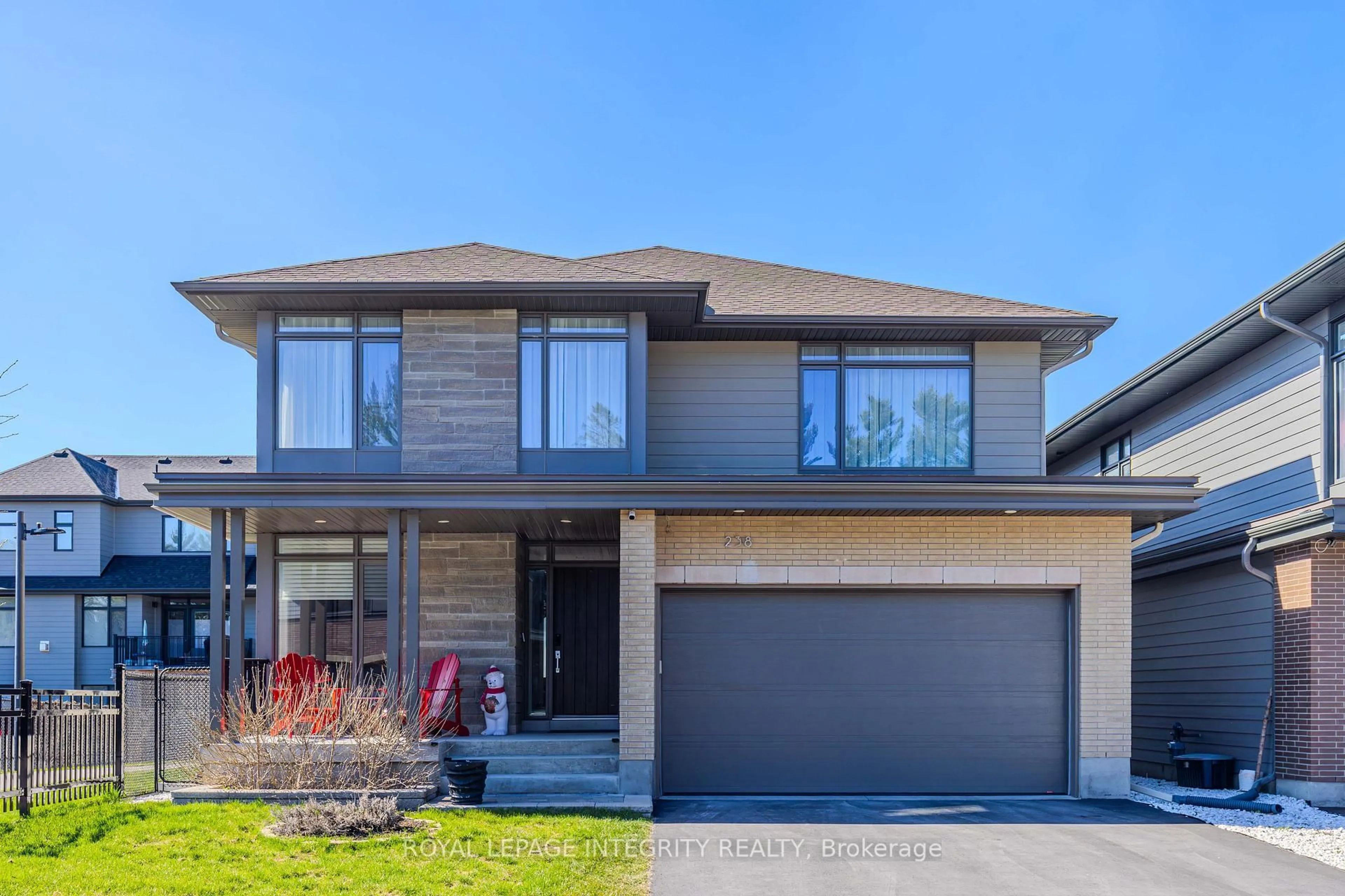 Home with brick exterior material, street for 238 Ketchikan Cres, Ottawa Ontario K2T 0S3