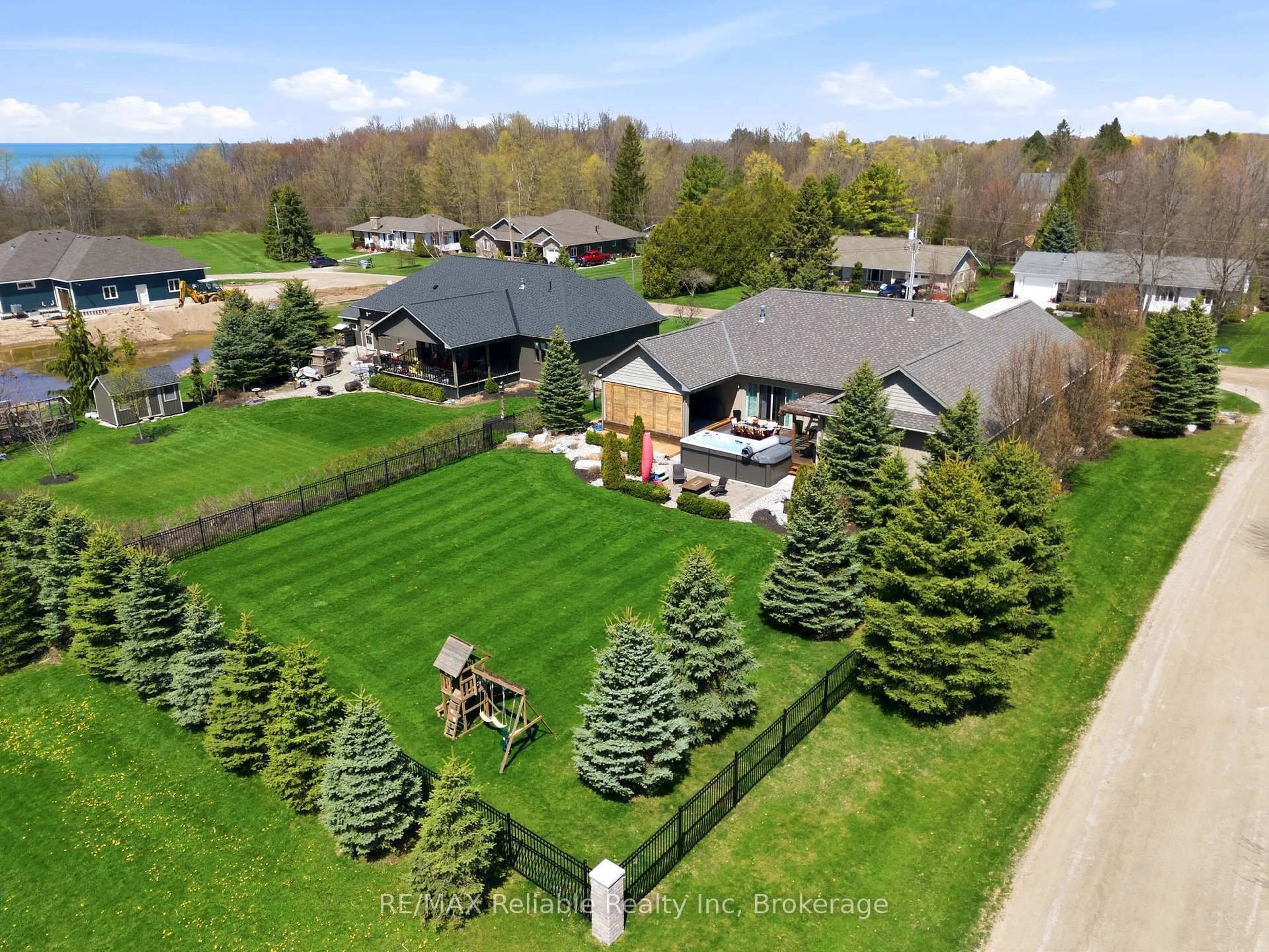 A pic from outside/outdoor area/front of a property/back of a property/a pic from drone, unknown for 74764 Elm Cres, Bluewater Ontario N0M 1G0