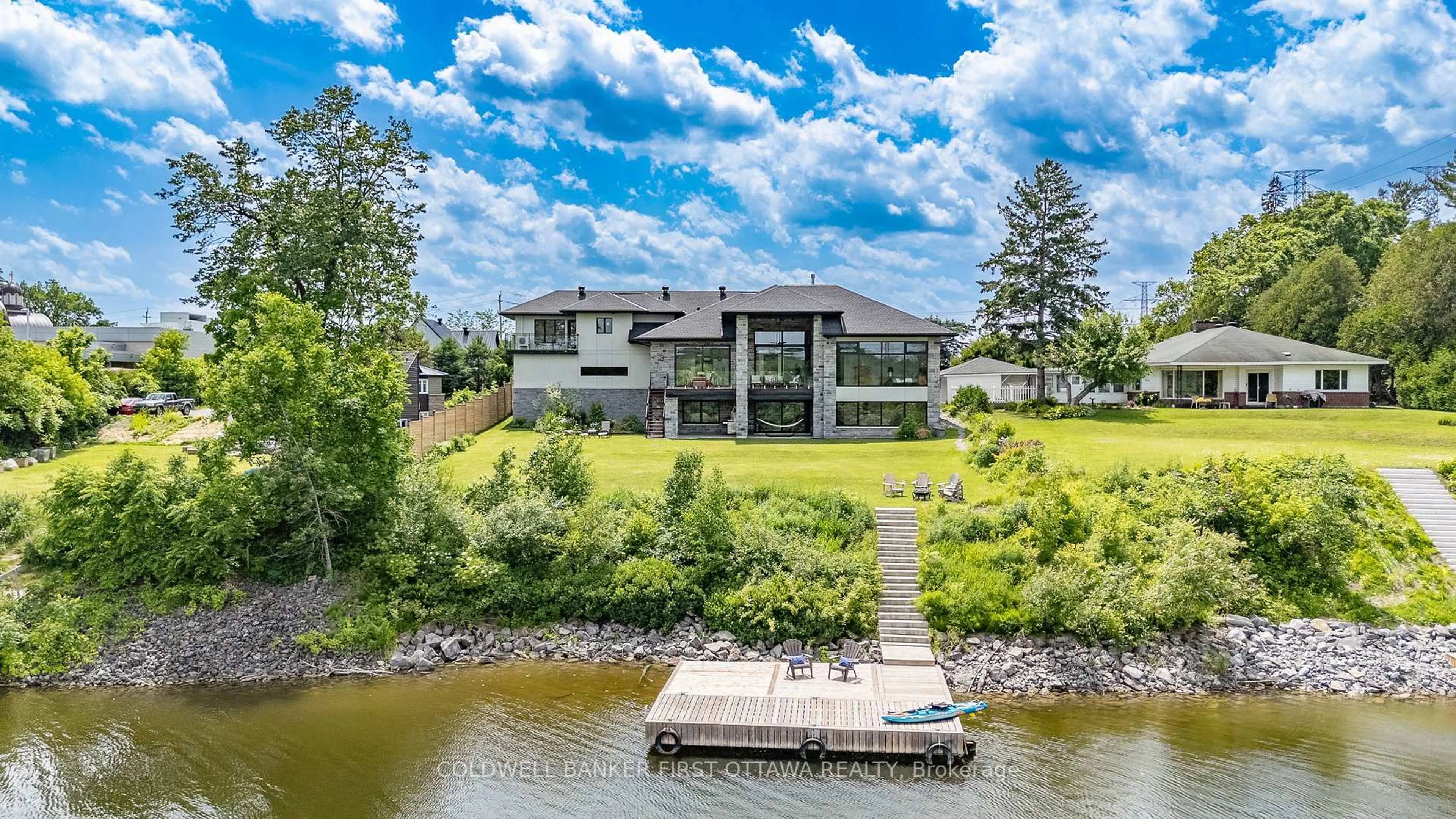A pic from outside/outdoor area/front of a property/back of a property/a pic from drone, water/lake/river/ocean view for 1981 PRINCE OF WALES Dr, Ottawa Ontario K2C 3J7