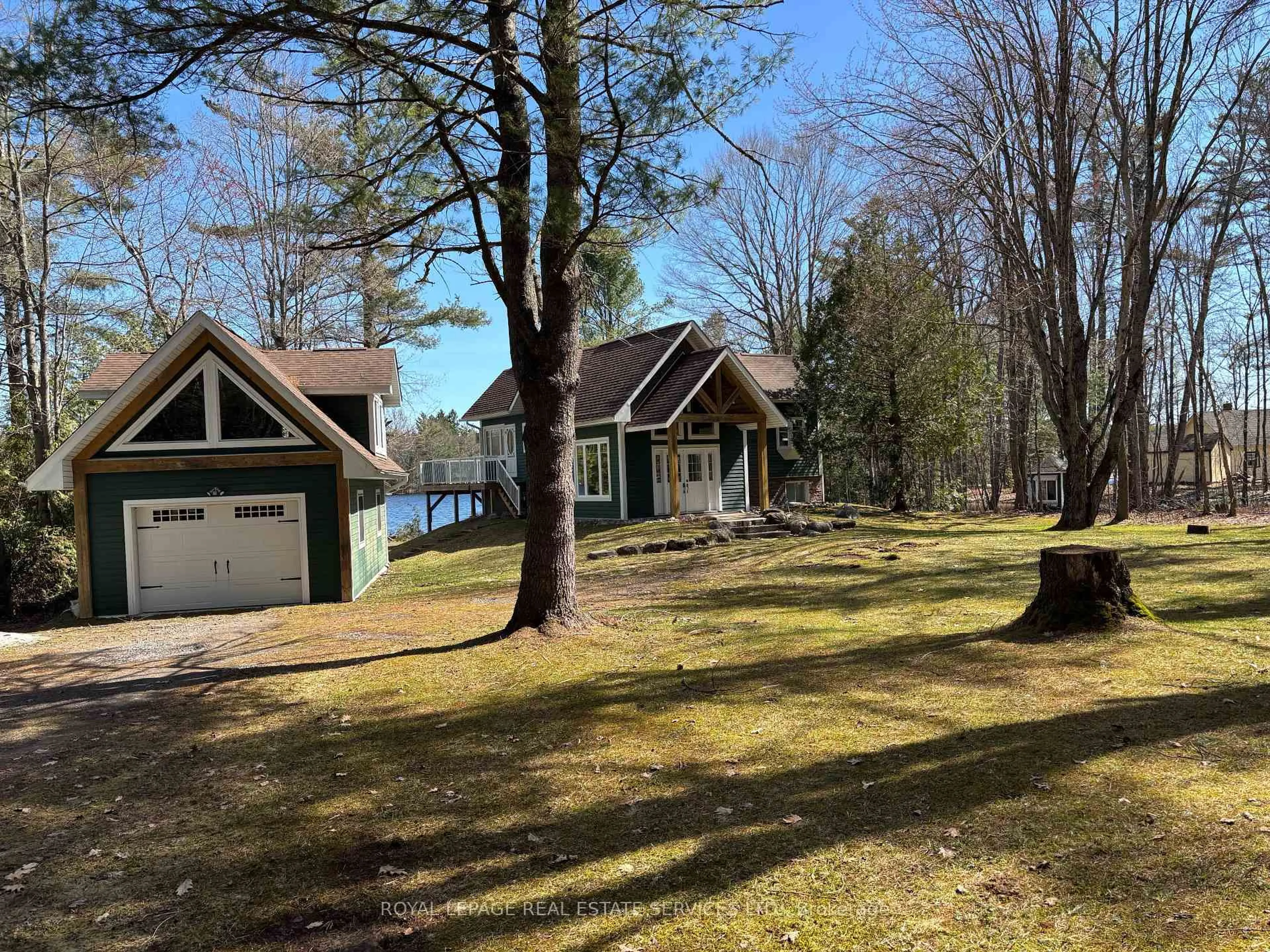 A pic from outside/outdoor area/front of a property/back of a property/a pic from drone, water/lake/river/ocean view for 1383 Moon River Rd, Muskoka Lakes Ontario P0C 1A0