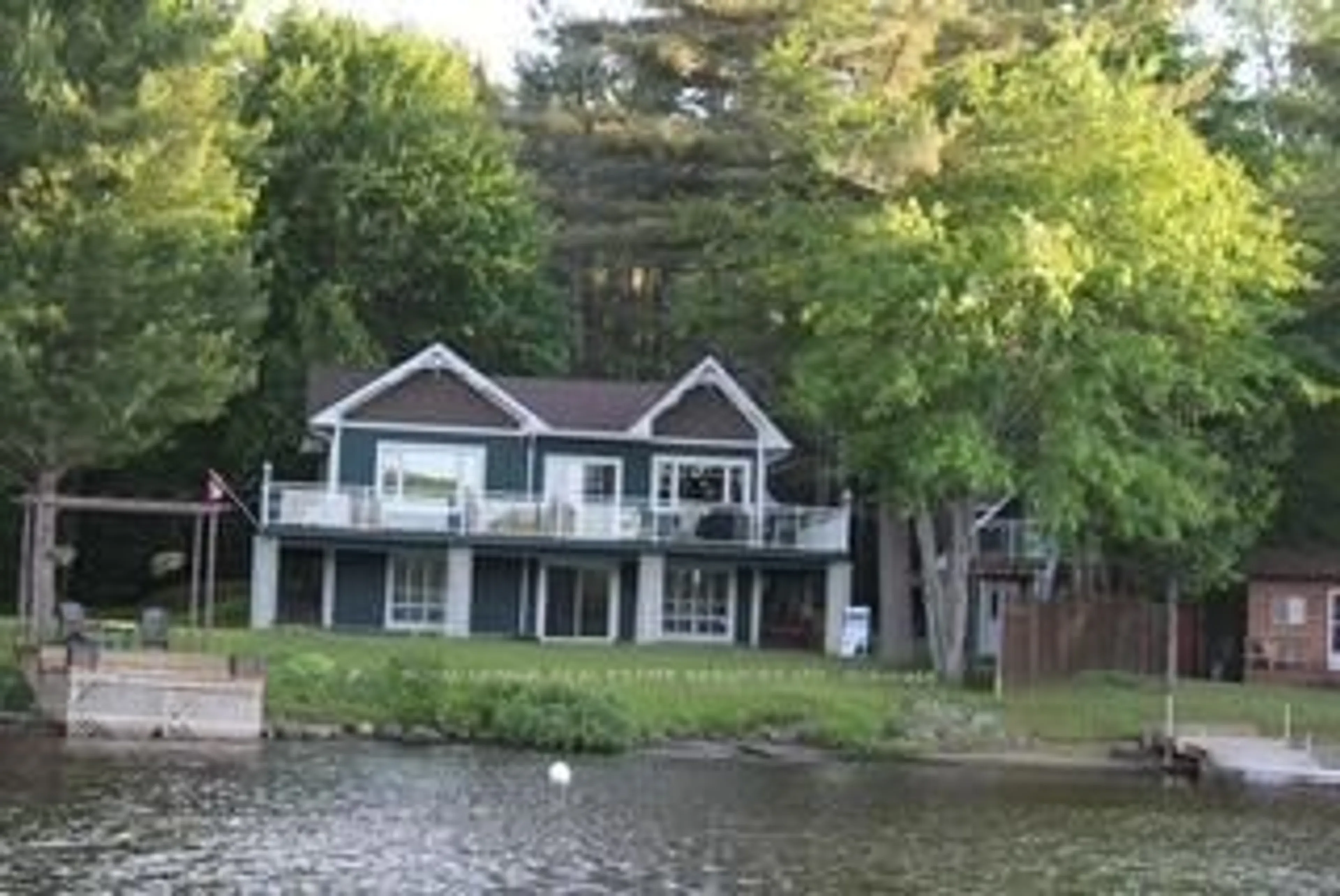 A pic from outside/outdoor area/front of a property/back of a property/a pic from drone, water/lake/river/ocean view for 1383 Moon River Rd, Muskoka Lakes Ontario P0C 1A0