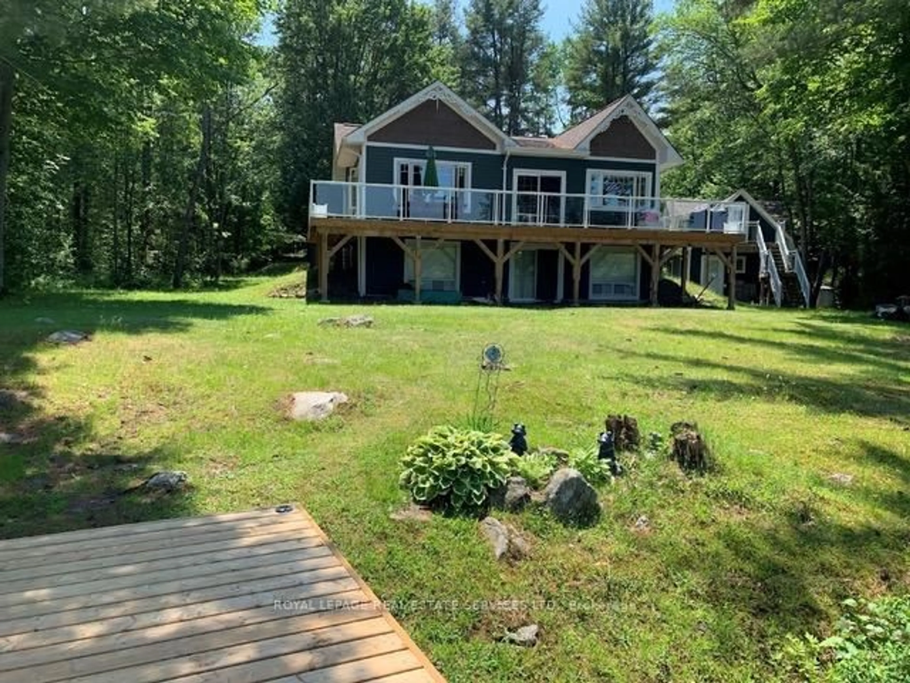 A pic from outside/outdoor area/front of a property/back of a property/a pic from drone, water/lake/river/ocean view for 1383 Moon River Rd, Muskoka Lakes Ontario P0C 1A0