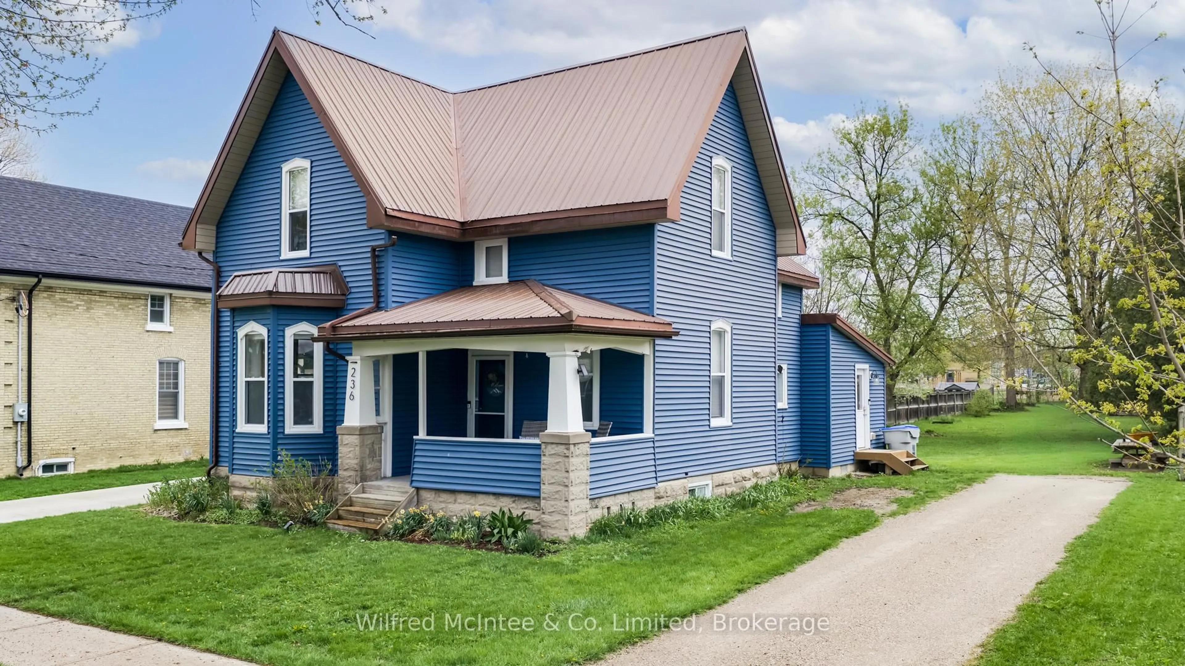 Home with vinyl exterior material, street for 236 Andrew St, South Huron Ontario N0M 1S1