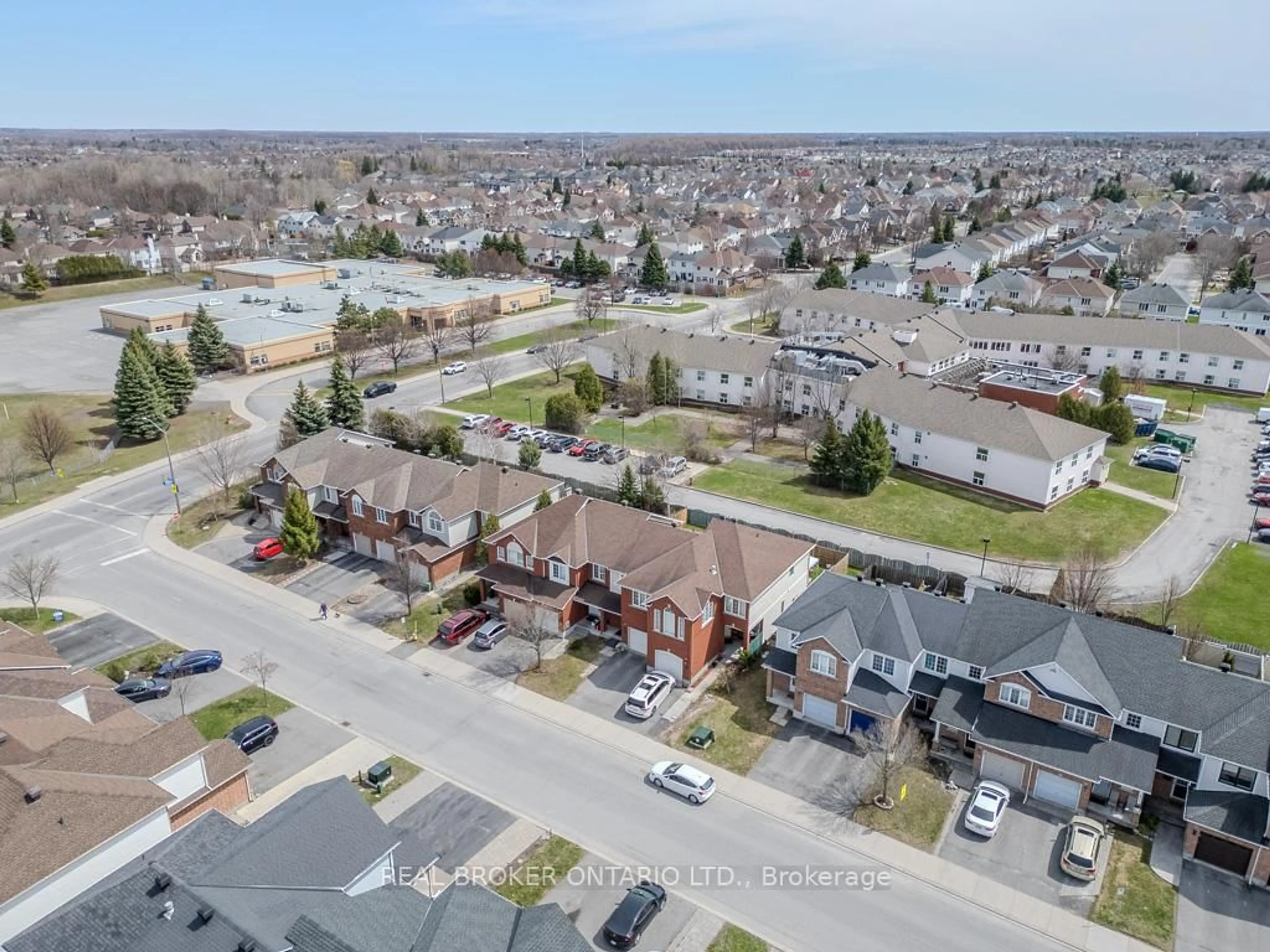 A pic from outside/outdoor area/front of a property/back of a property/a pic from drone, street for 15 Calaveras Ave, Ottawa Ontario K2J 4Z8