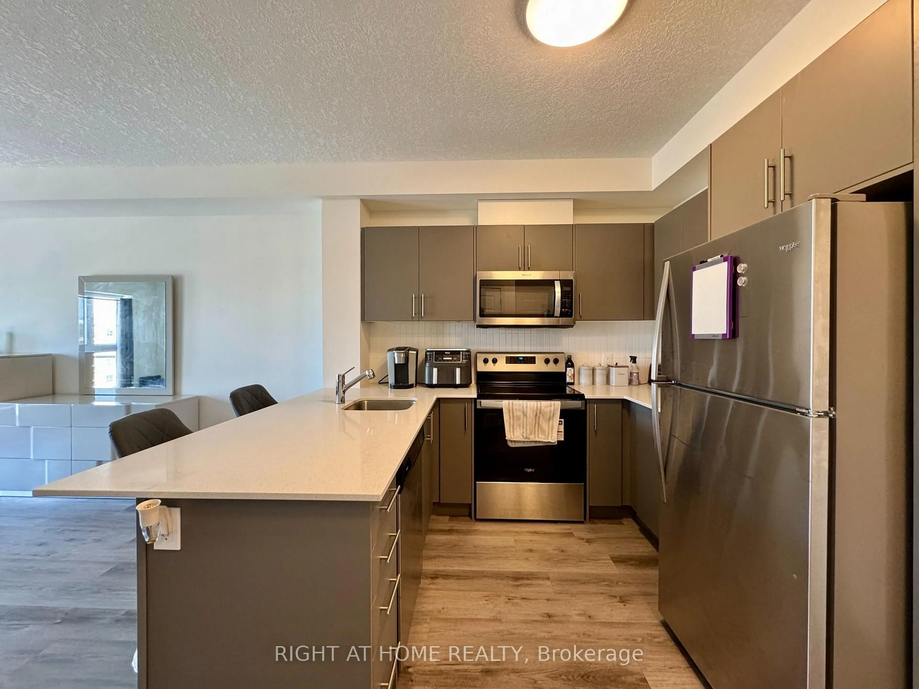 Open concept kitchen, unknown for 1101 Lackner Pl #401, Kitchener Ontario N2A 4G3