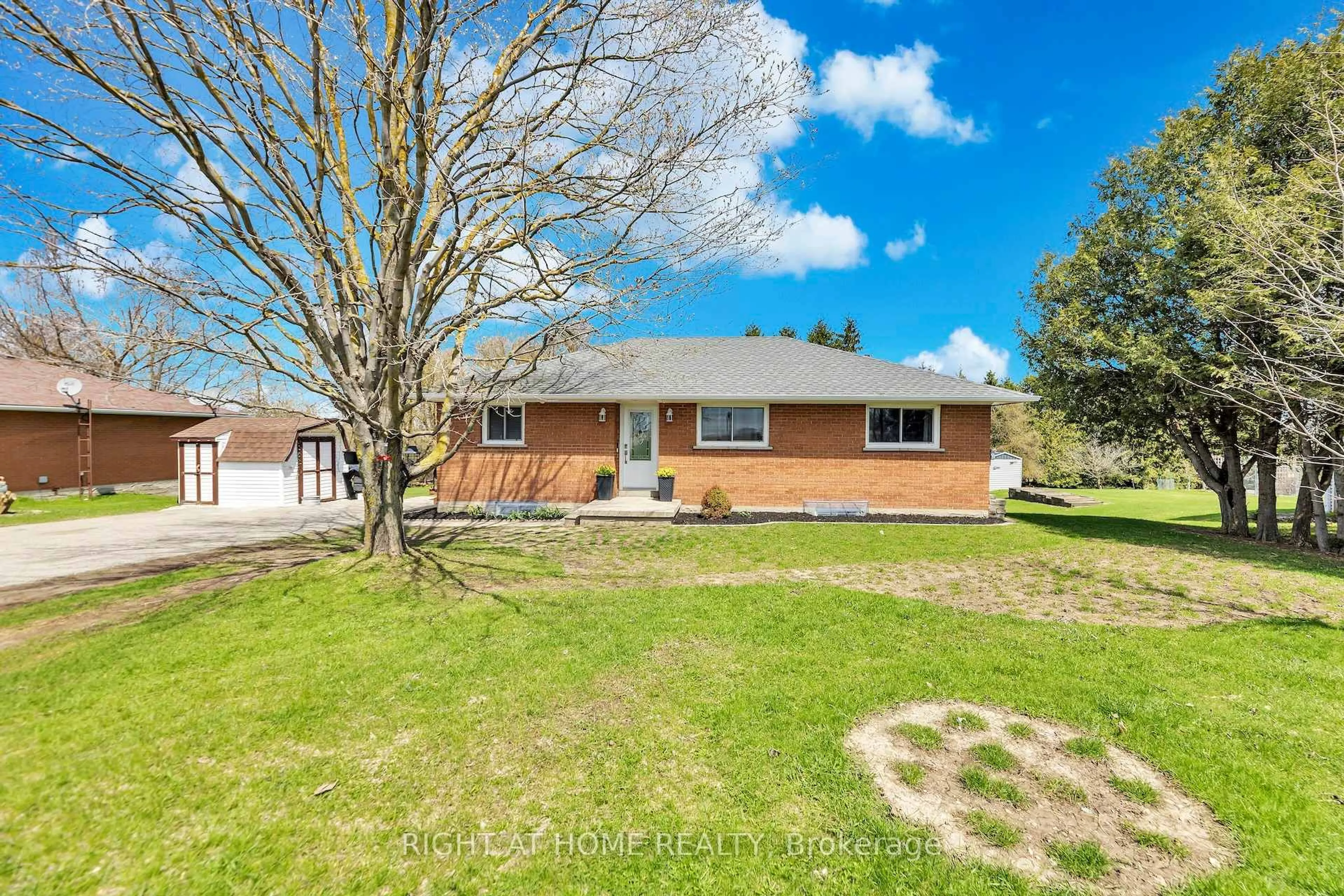 A pic from outside/outdoor area/front of a property/back of a property/a pic from drone, street for 7629 Hwy 6, R.R. # 1 Highway, Wellington North Ontario N0G 1A0